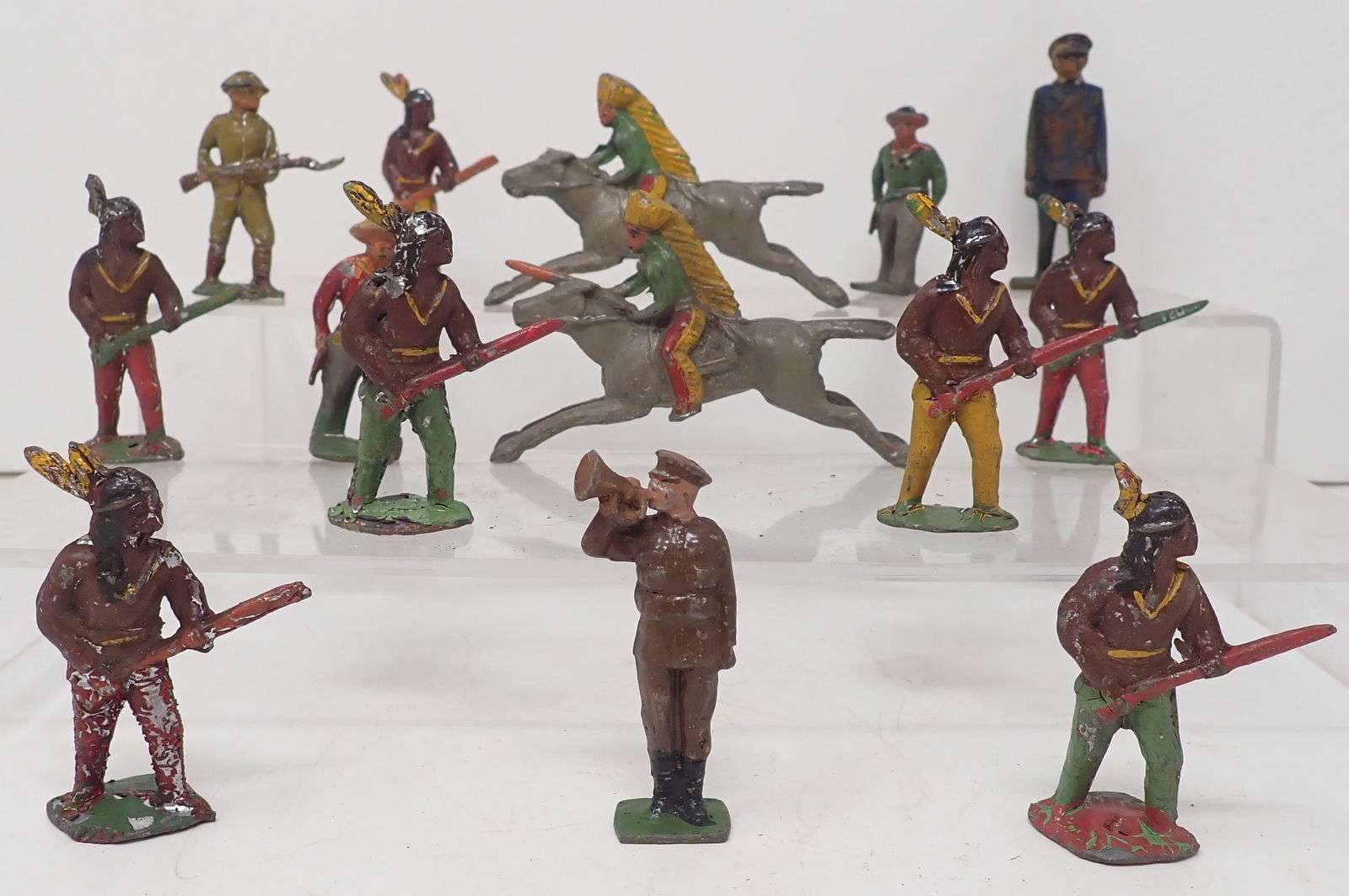 Cast Iron Policeman , Lead Cowboys & Indians: Policeman is apprx 2 3/4" tall. Shipping available