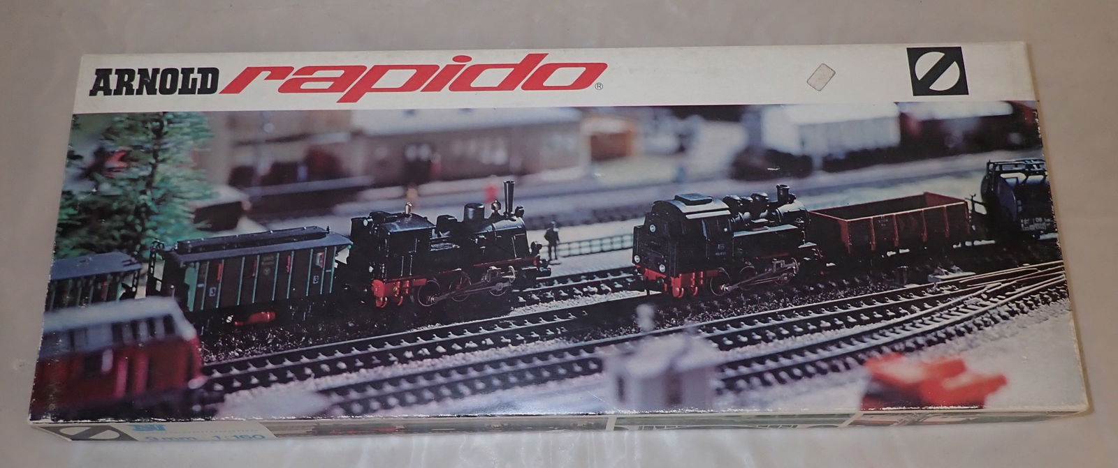 Arnold Rapido N Scale Train Set: Missing transformer. We do not guarantee it is complete. Sold as pictured. Shipping available