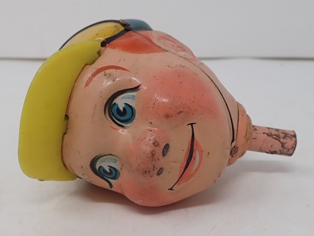 Tin Litho Toy Head: Approx 3" long. Shipping available