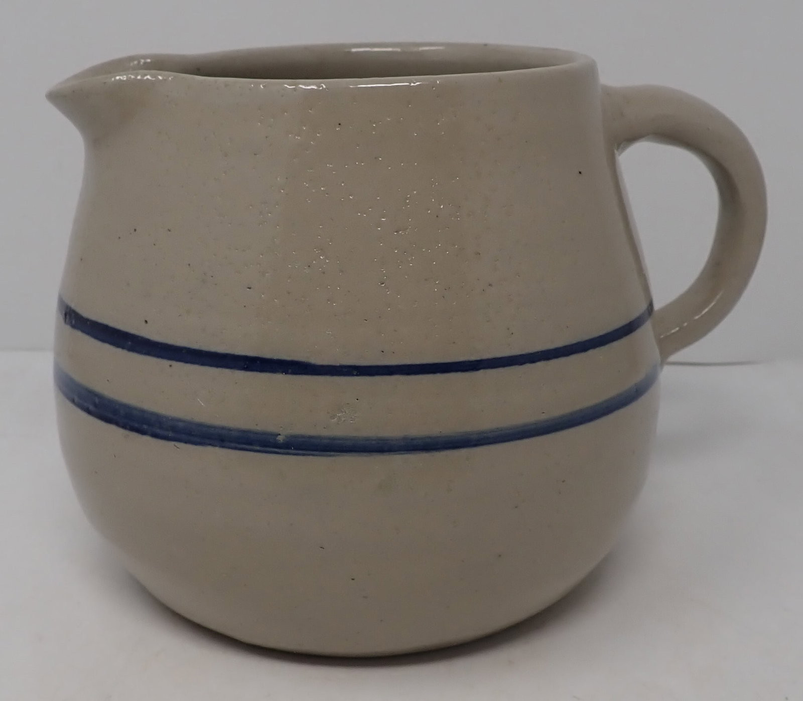 Pottery Water Pitcher: Apprx 5 1/2" tall. Shipping available