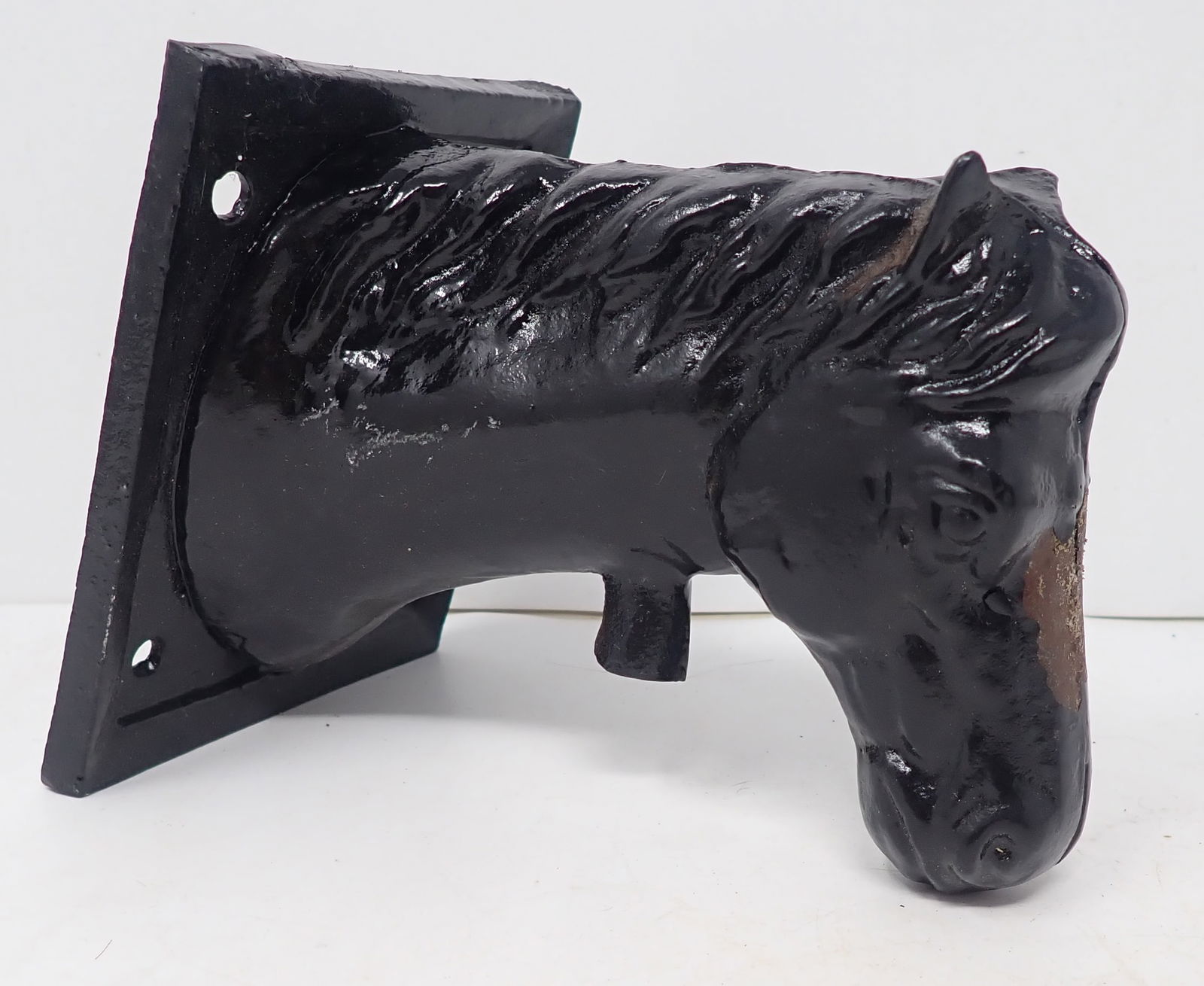 Cast Iron Horse Hanger: Approx 4 1/4" x 5 1/2" x 6 1/2" deep. Shipping available