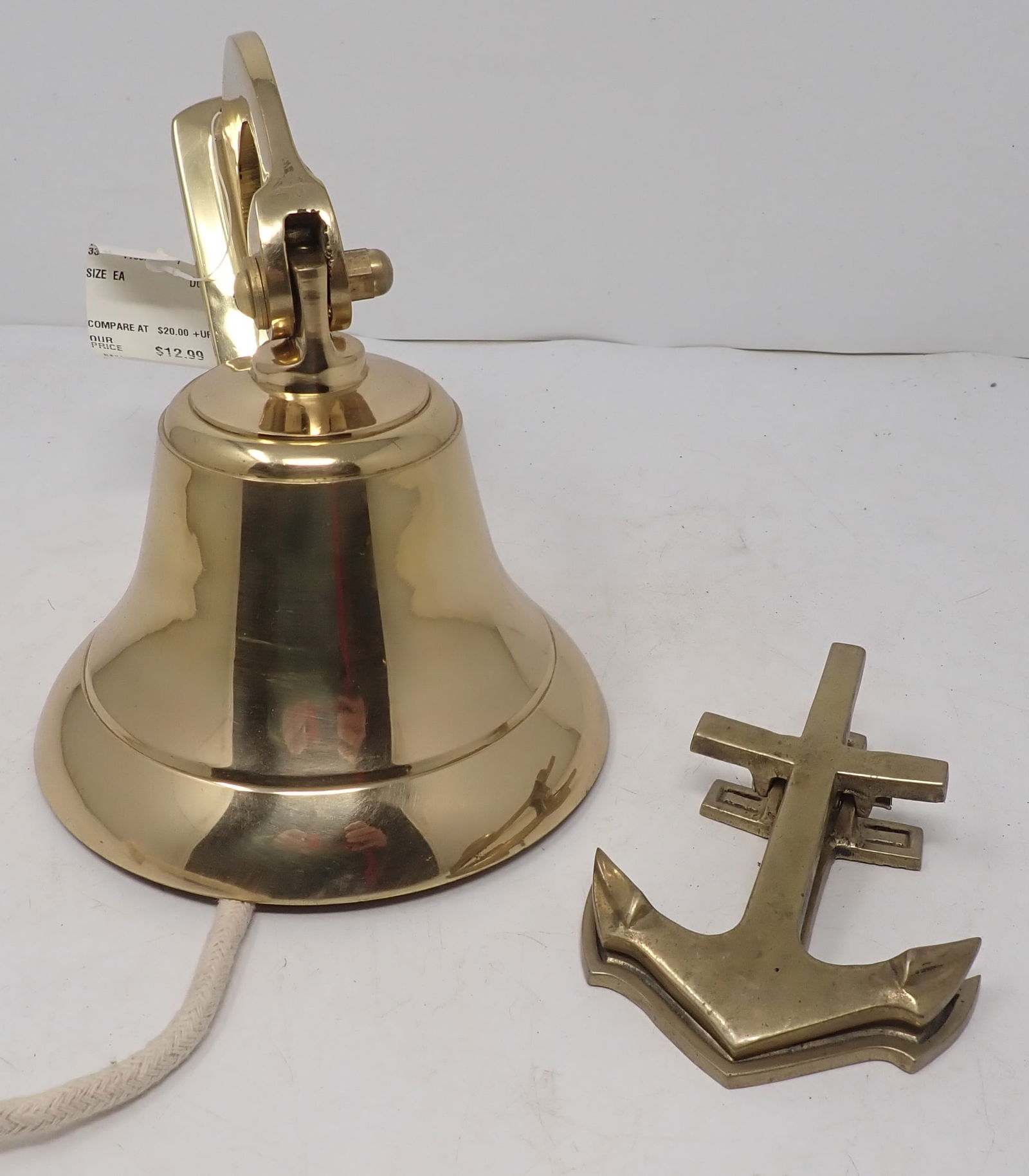 Brass Bell & Paper Holder: Bell is apprx 5 1/8" in diameter and 6 3/4" tall. Shipping available