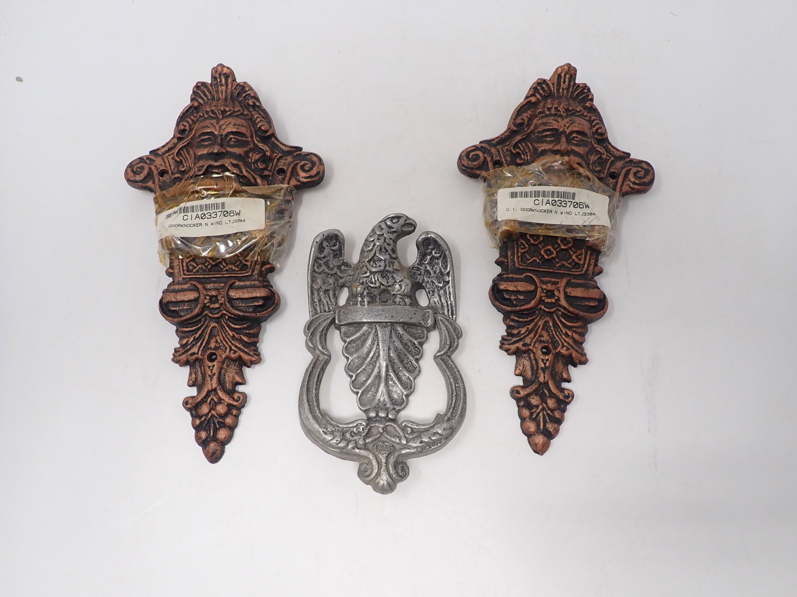 Cast Iron North Wind & Aluminum Eagle Doorknockers: Doorknockers - Largest are apprx 5 3/8" x 10 1/4". Shipping available