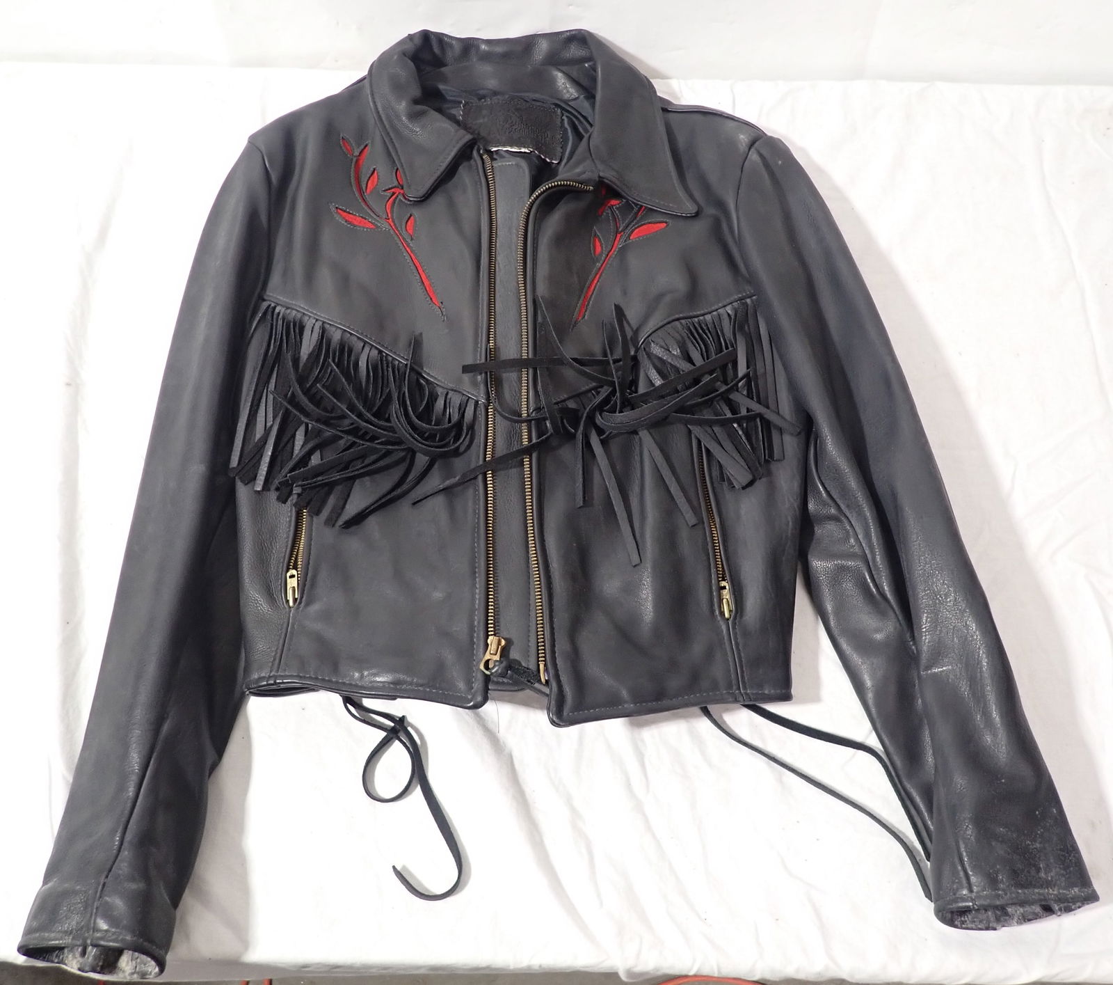 Branded Garments Leather Fringe Jacket: No size tag . Approx 17" pit to pit and 24" long. Shipping available