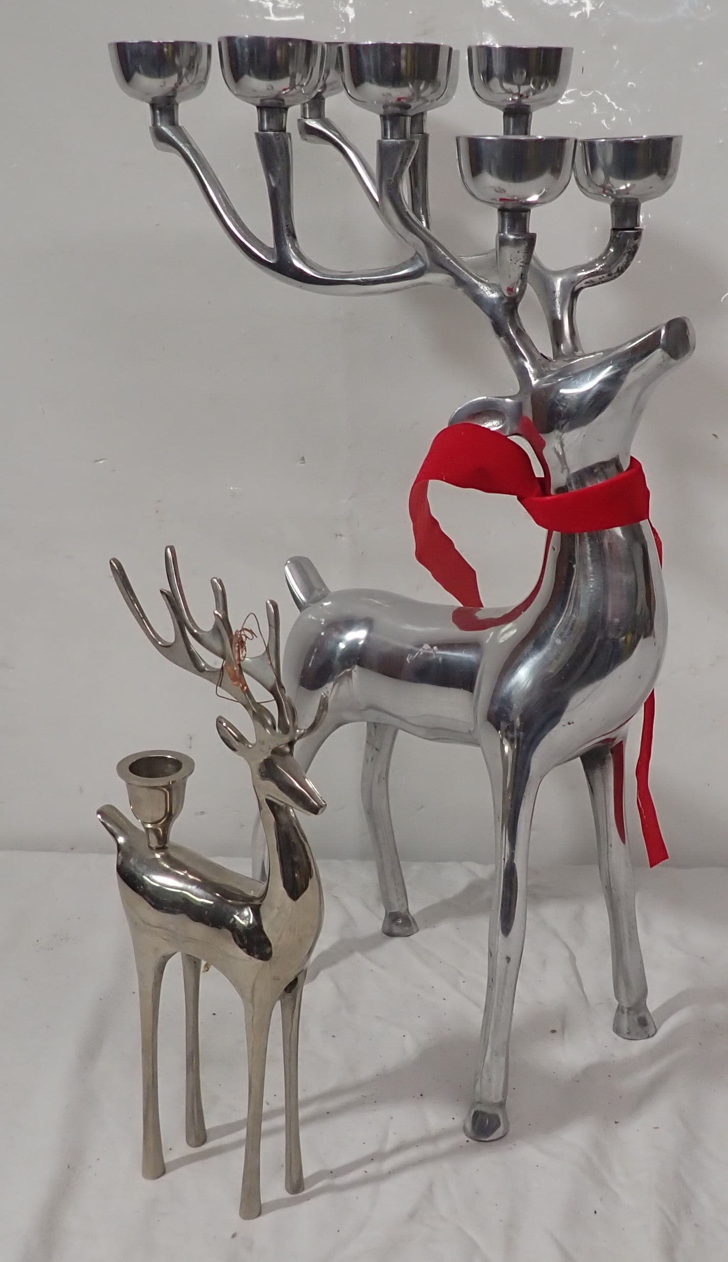 Aluminum Deer Candle Holders: Tallest is apprx 19 3/4" tall. Shipping available ($20 handling charge, plus postage)