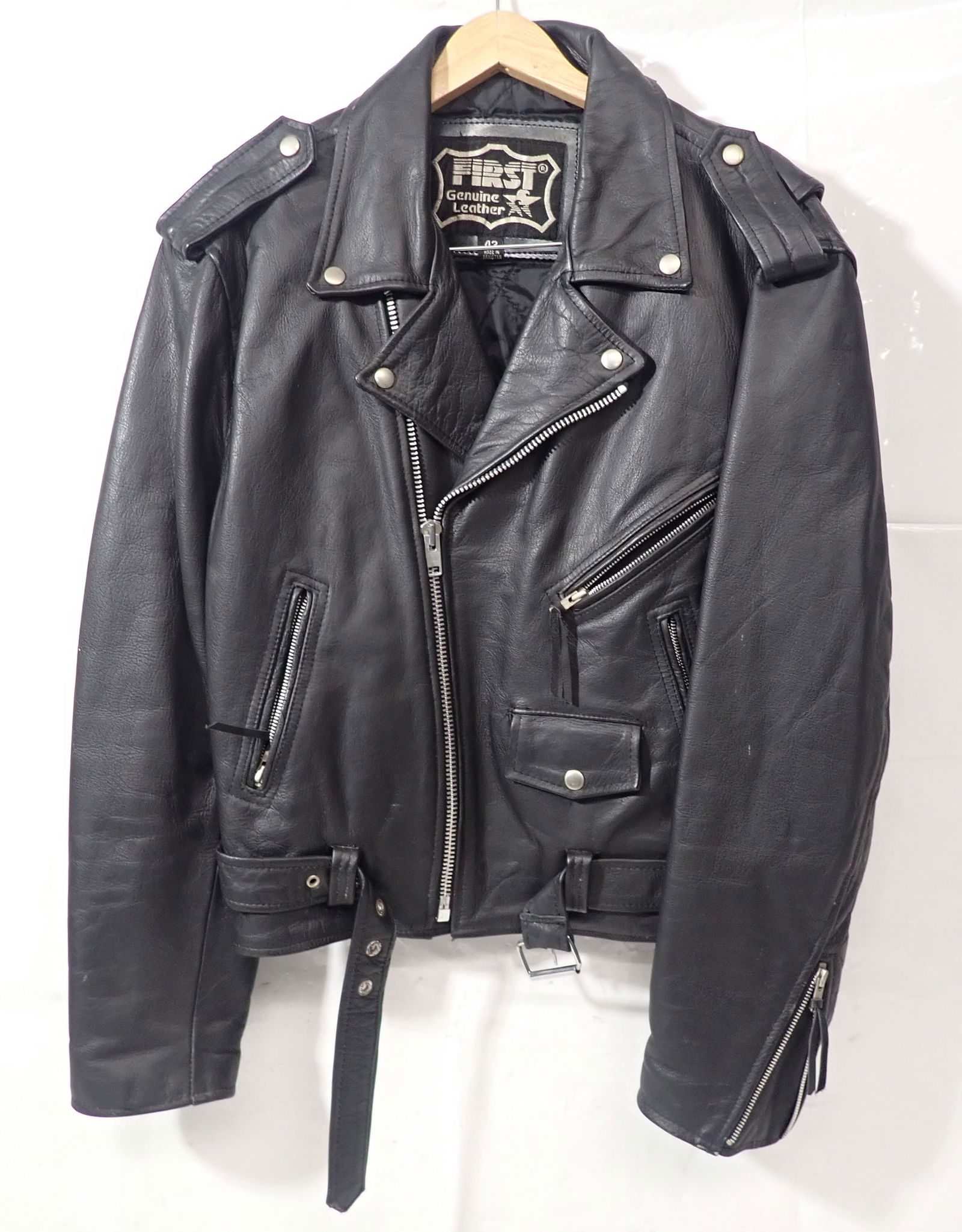 First Genuine Leather Motorcycle Jacket: Size - 42 . Shipping available