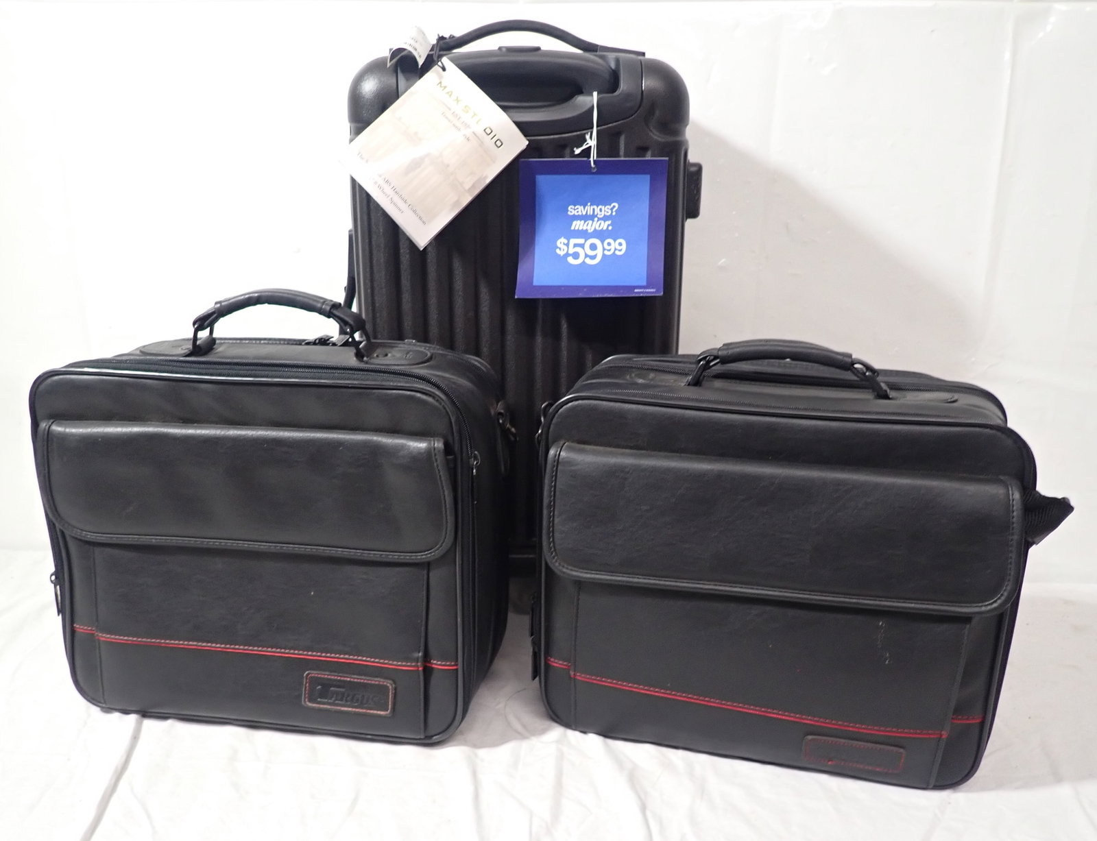 Maxstudio Luggage & Targus Bags: Largest is apprx 9" x 12" x 22 3/4" tall. Shipping available