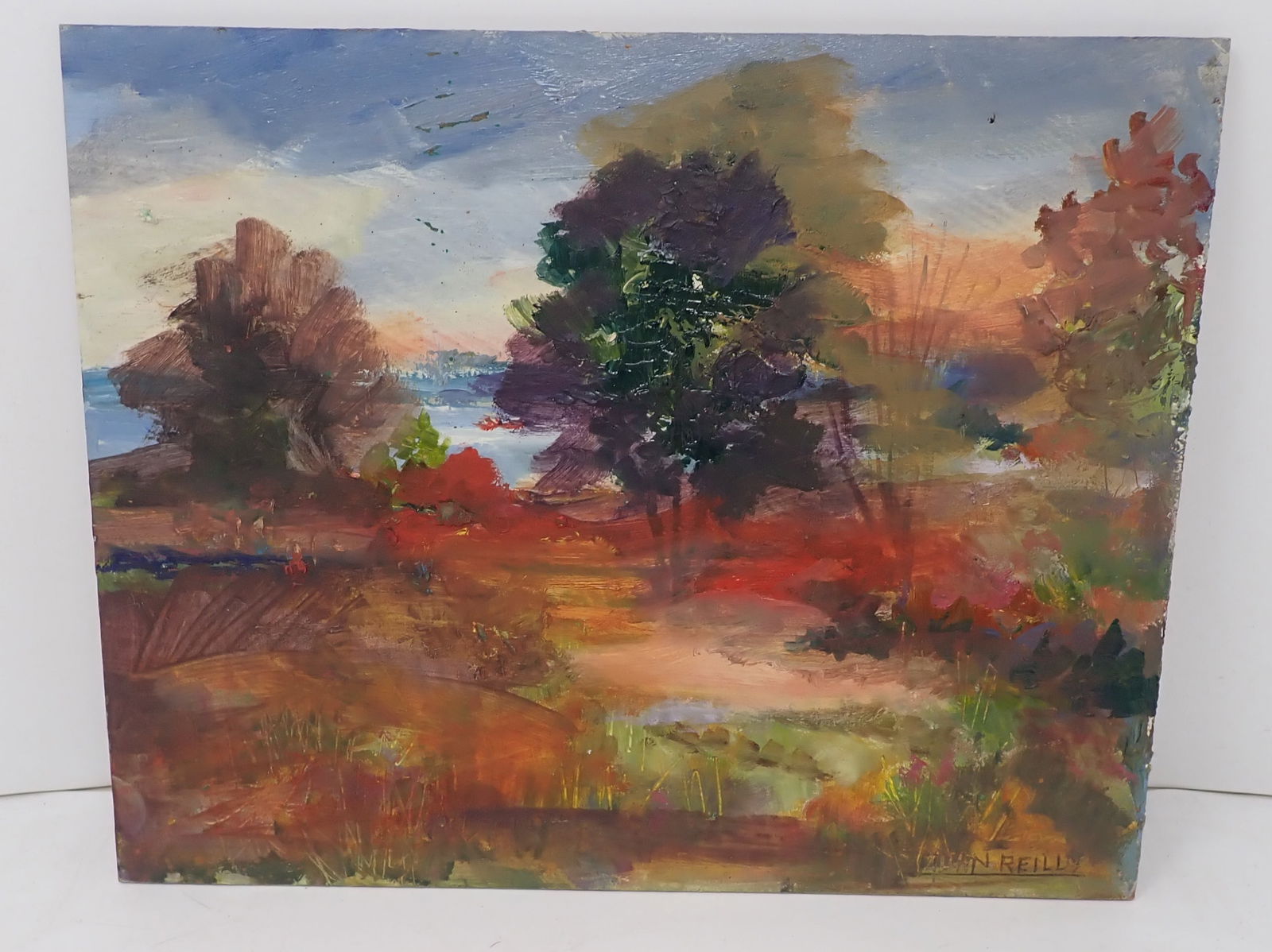 John Reilly Signed Landscape Oil on Board Painting: Approx 9" x 11 1/4". Shipping available
