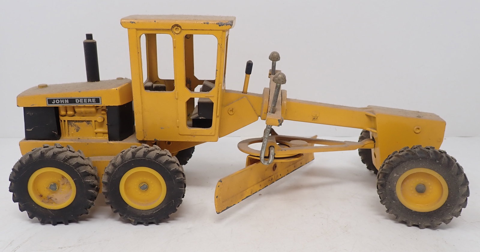 John Deere Grader: Apprx 12" long. Shipping available
