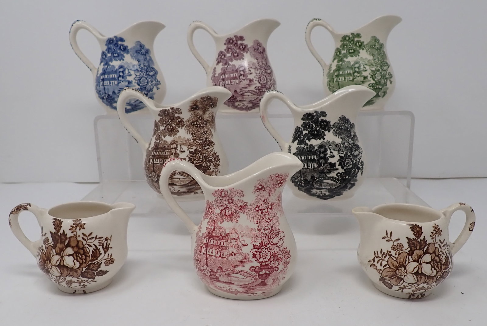 Royal Staffordshire Clarice Cliff Creamers: Tallest are approx 3 1/2" tall. Shipping available