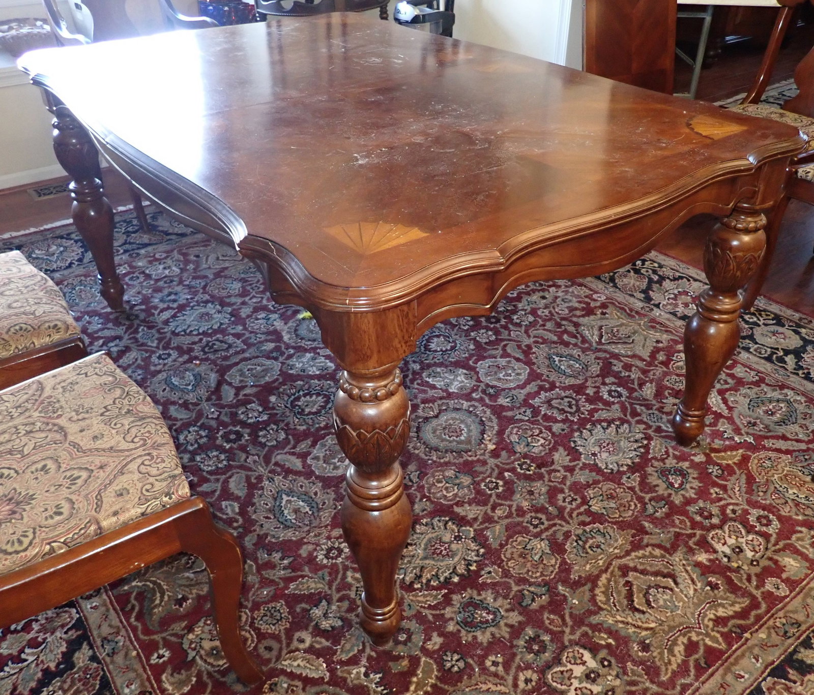 Dining Room Table w/ Turned Legs: Pick up between 1pm & 3pm ONLY ! Bring proper help & tools to remove. Legs probably need to be taken off to remove from house. Do not slide on floor ! Approx 42" X 63" x 30" tall. Comes with an 18" le