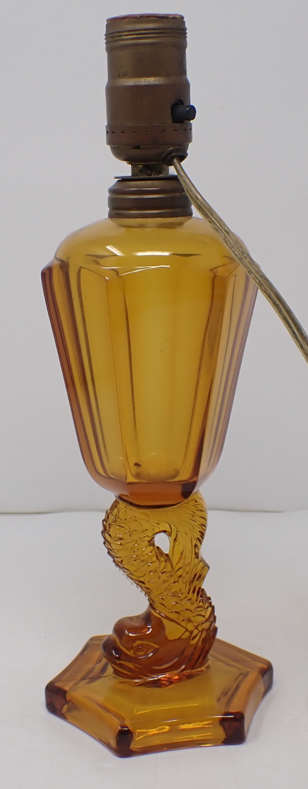 Amber Glass Table Lamp w/ Dolphin: Apprx 12" tall. Shipping available