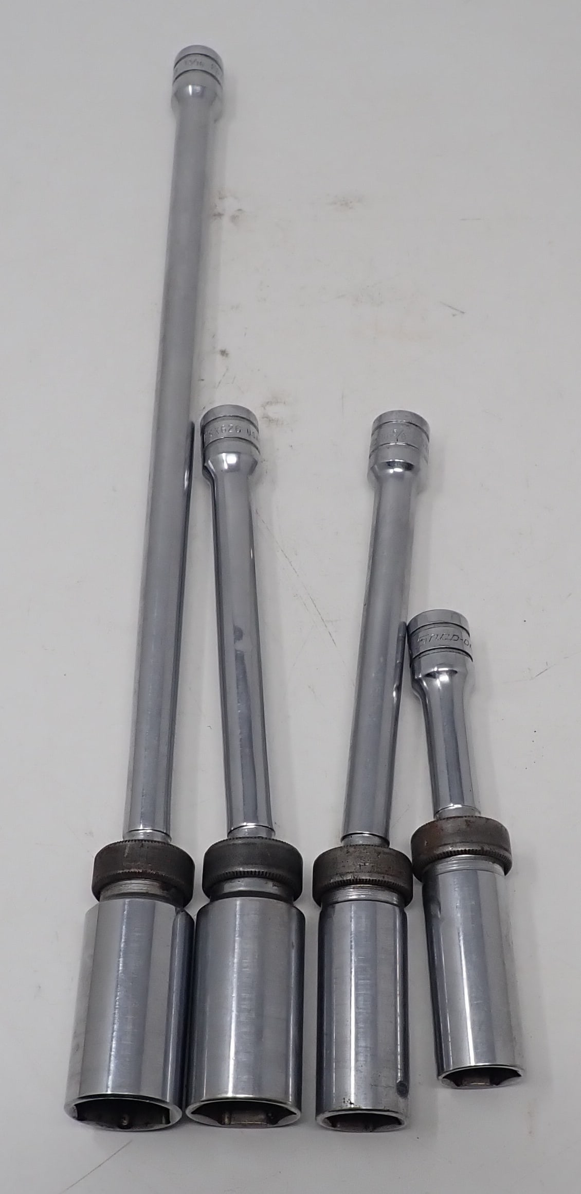 Snap-On 3/8" Drive Spark Plug Swivel Extensions: 13/16" & 5/8". Longest is approx 14" long. Shipping available