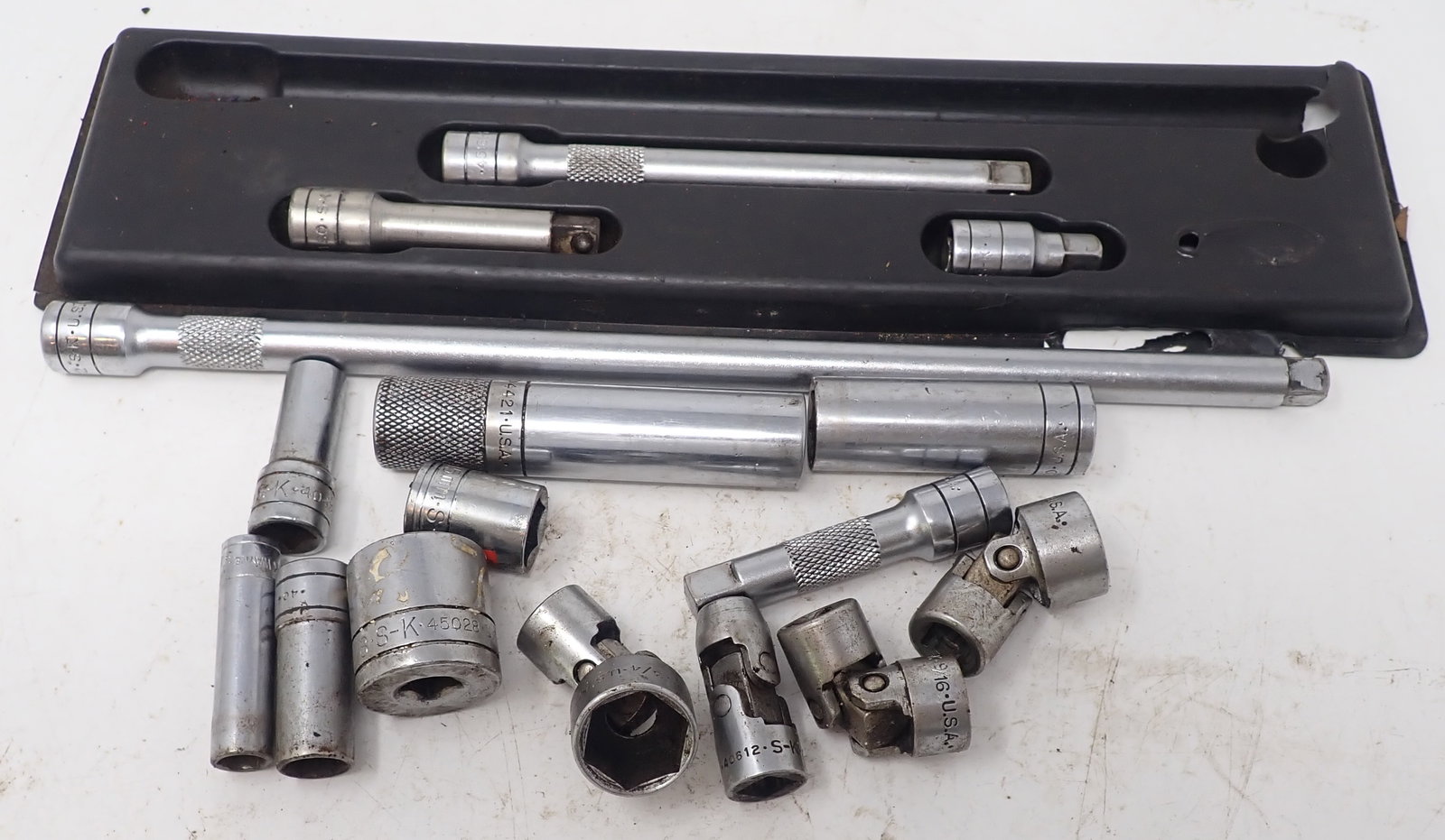S-K 3/8" Drive Sockets and Extensions: Longest extension is approx 12" long. Shipping available