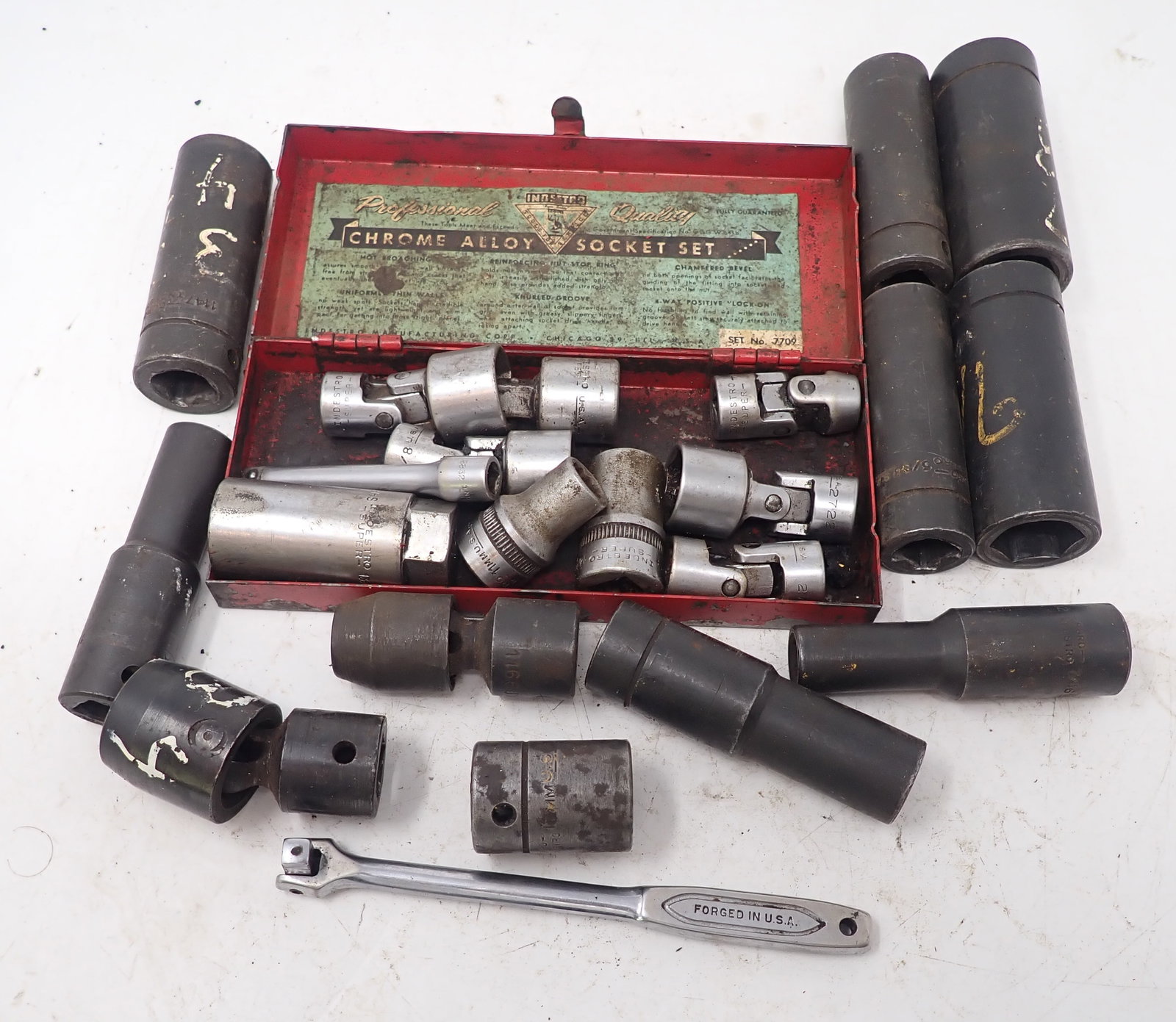 Indestro 3/8" Swivel , 1/2" Impact Sockets 1/4" Breaker Bar: Largest is 7/8". Shipping available