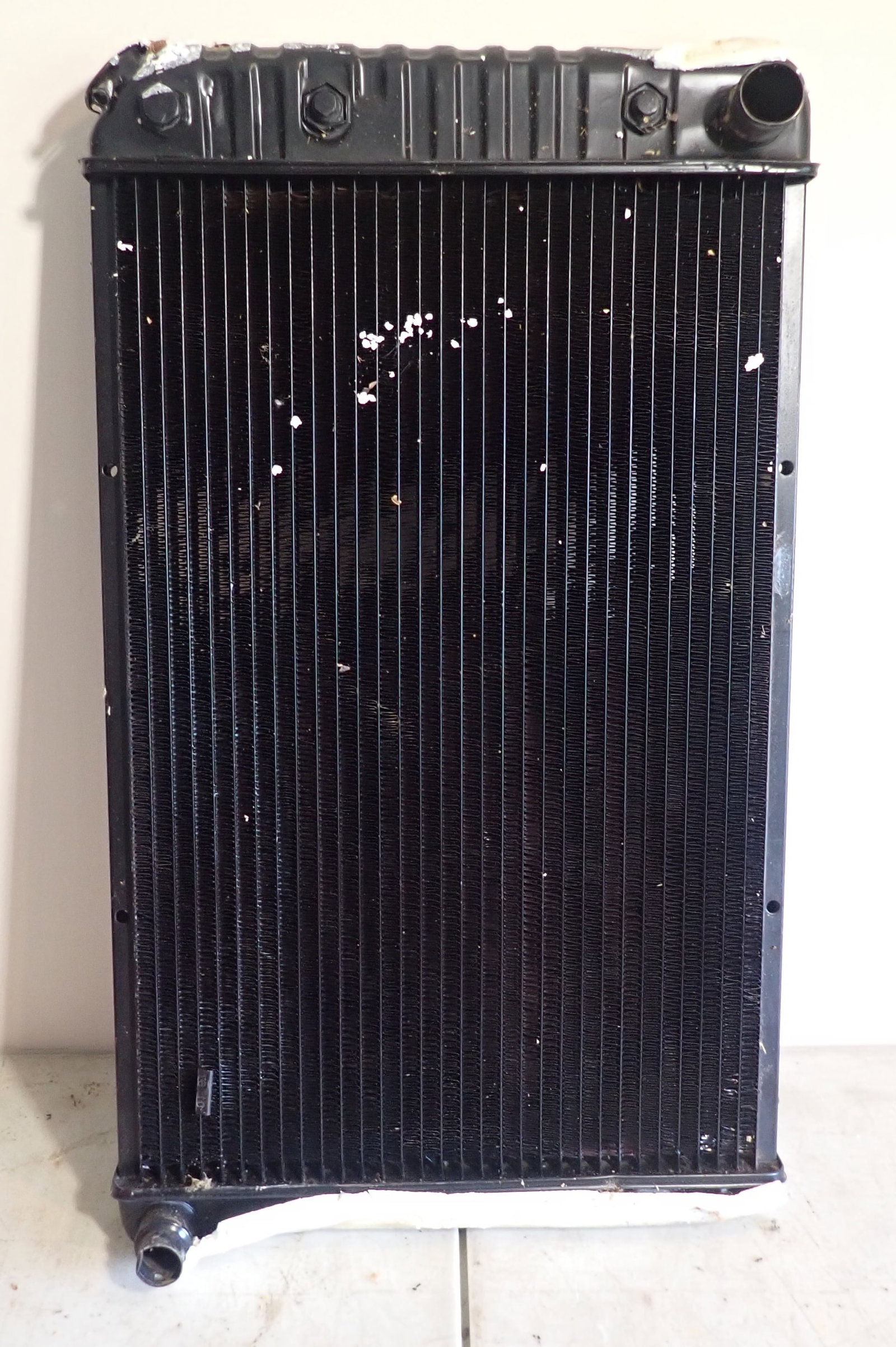 Radiator: Found a receipt with it that said it was redone in 1980's. Approx 3" x 18 1/2" x 31". No in house shipping !