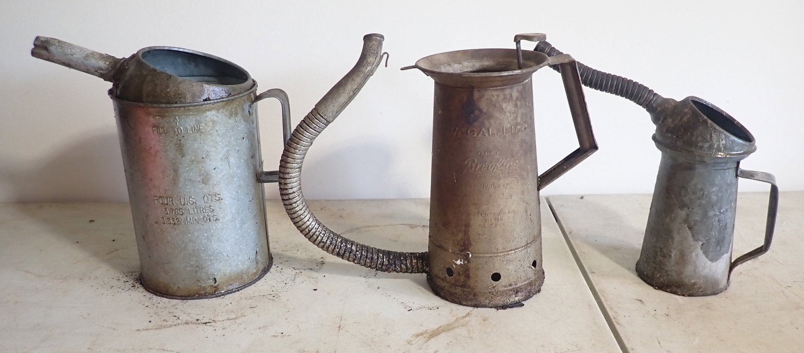 Service Station Galvanized Oil Cans incl Brookins: Tallest is approx 11 1/4". NO IN HOUSE SHIPPING !