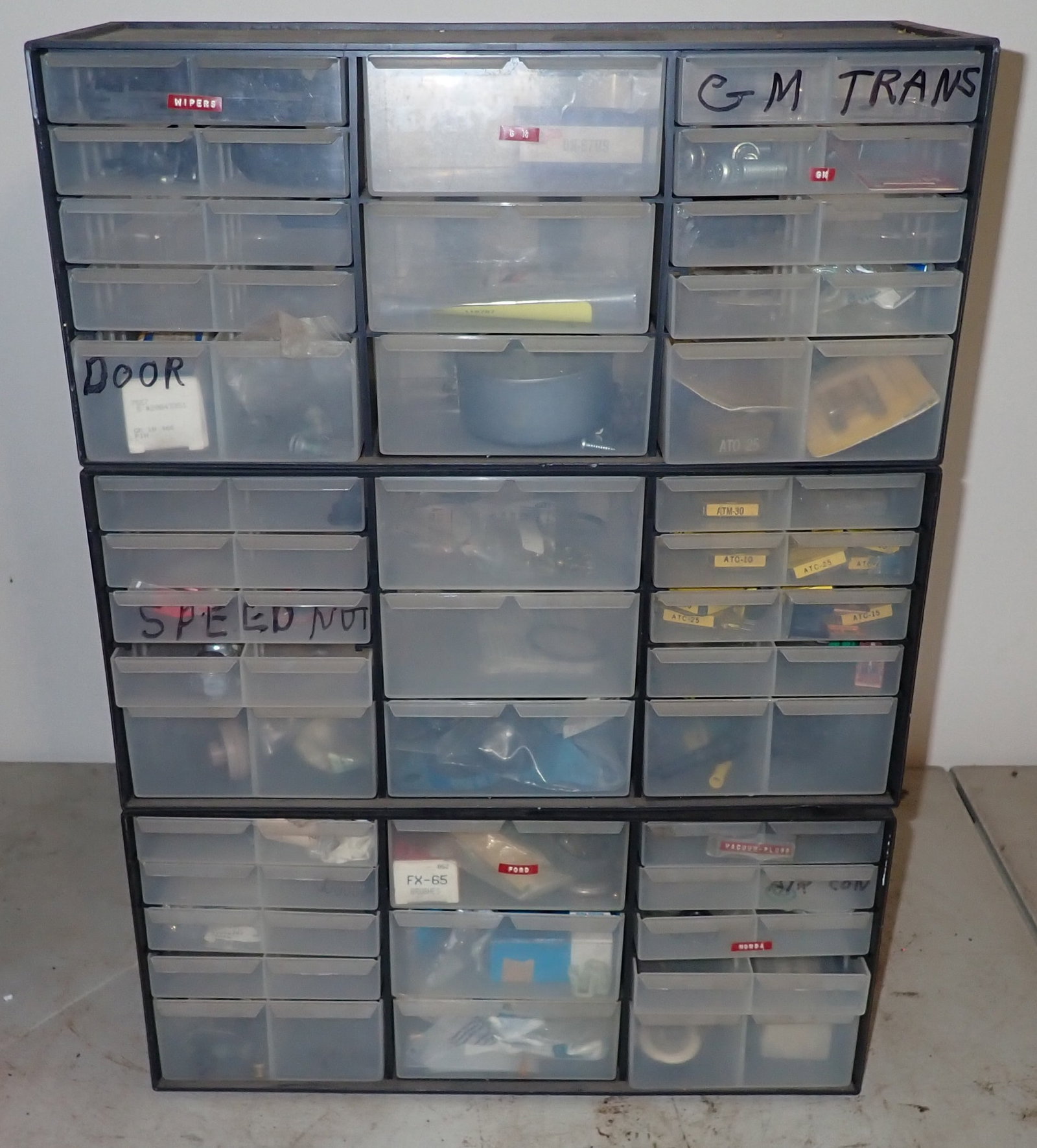 Parts Cabinets w/ Car Parts: 3 Cabinets together. Total measurements are apprx 6 1/4" x 17 1/2" x 24 1/2" tall. Shipping available ($30 handling charge, plus postage)