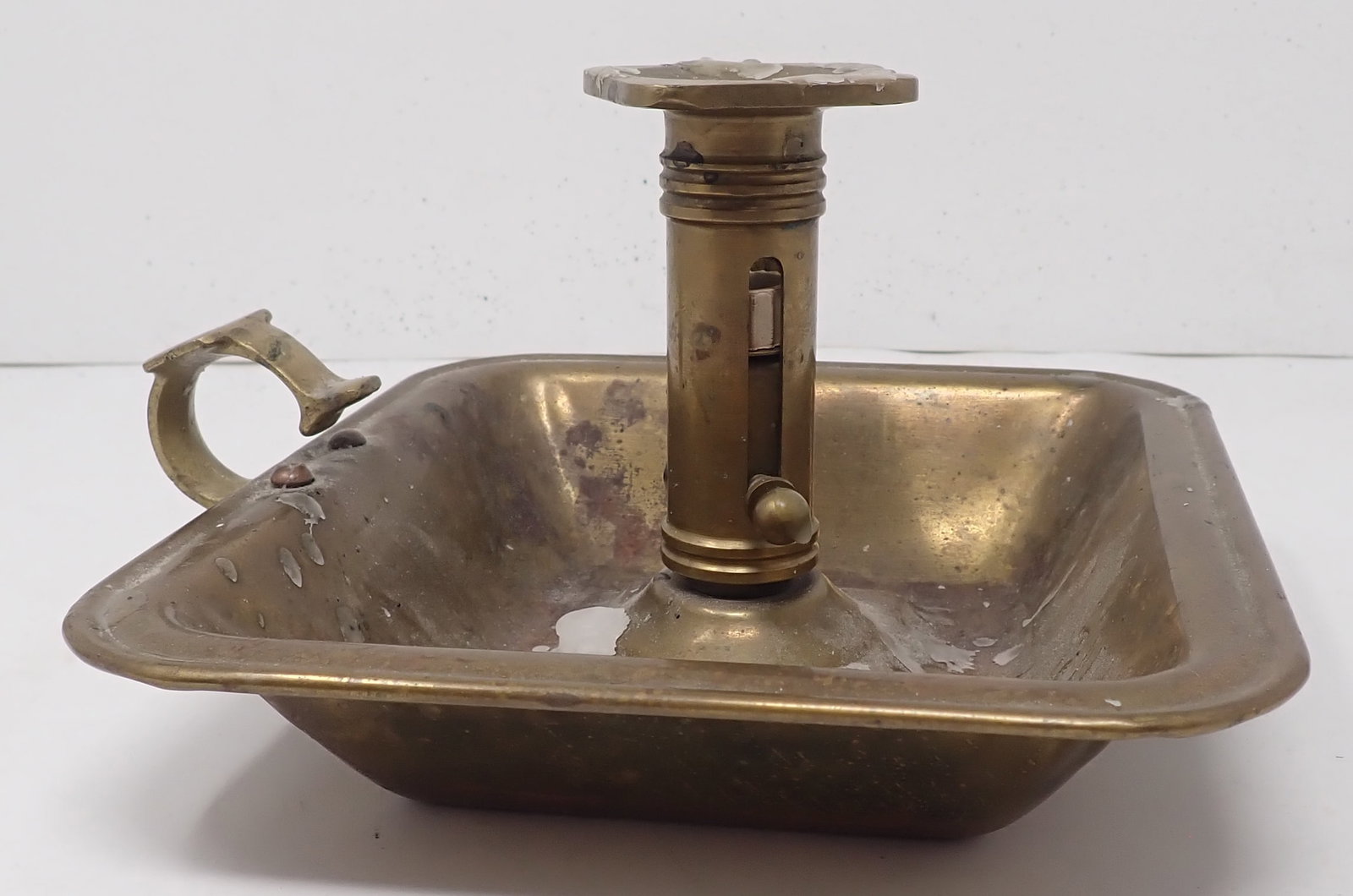 Brass Push Up Chamberstick Colder Holder: Approx 7 1/2" x 7 3/8" x 4 1/2" tall. Shipping available
