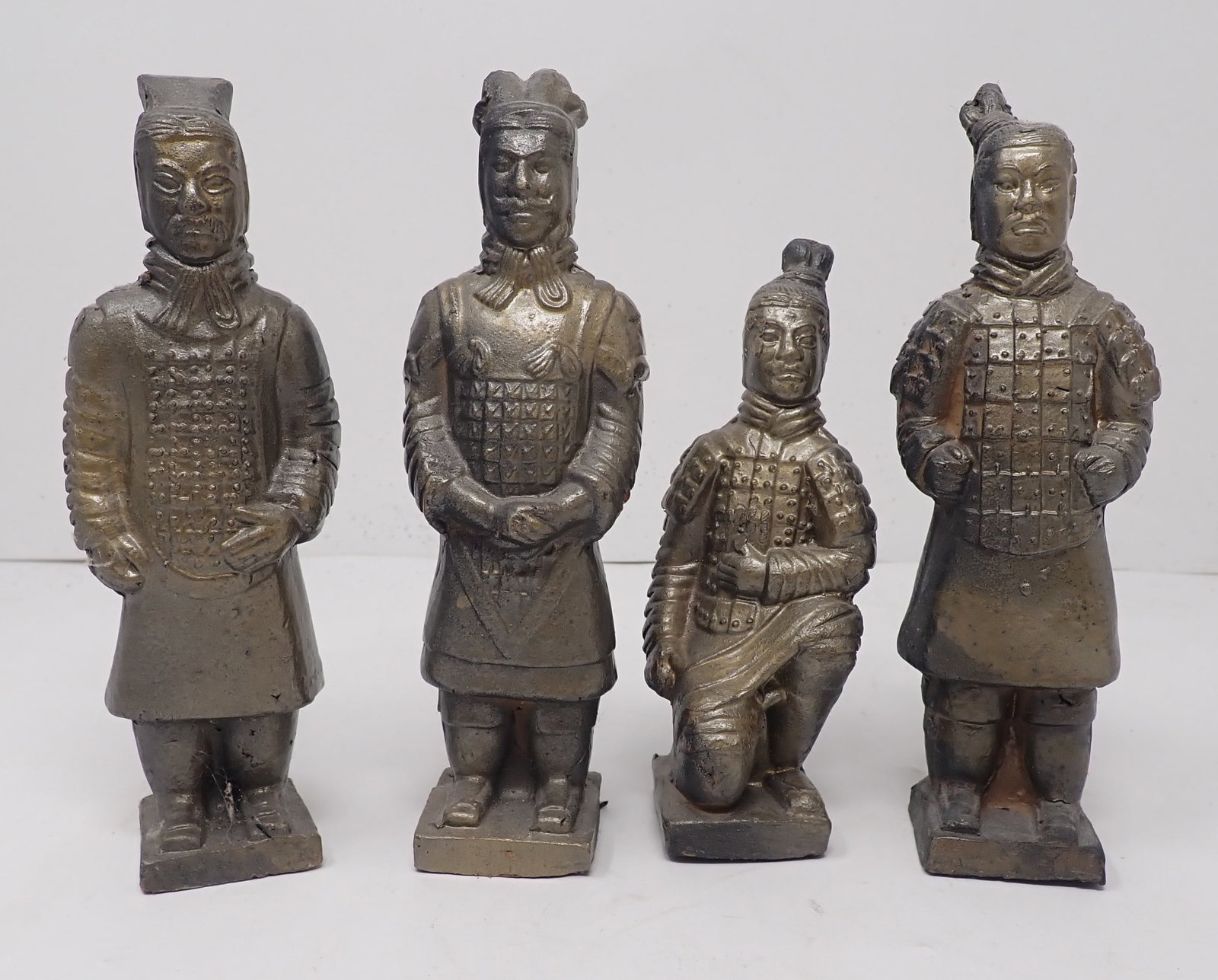 4 Chinese Terracotta Statues: Approx 6 1/2" tall. Shipping available
