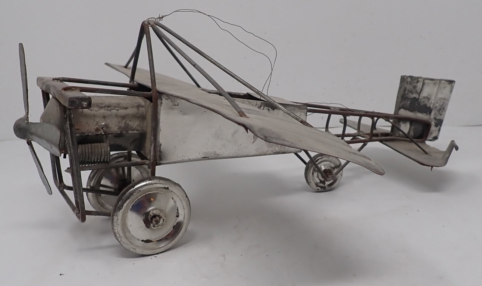 Tin Decorator Airplane: Approx 11 1/2" wide and 13" long. Shipping available