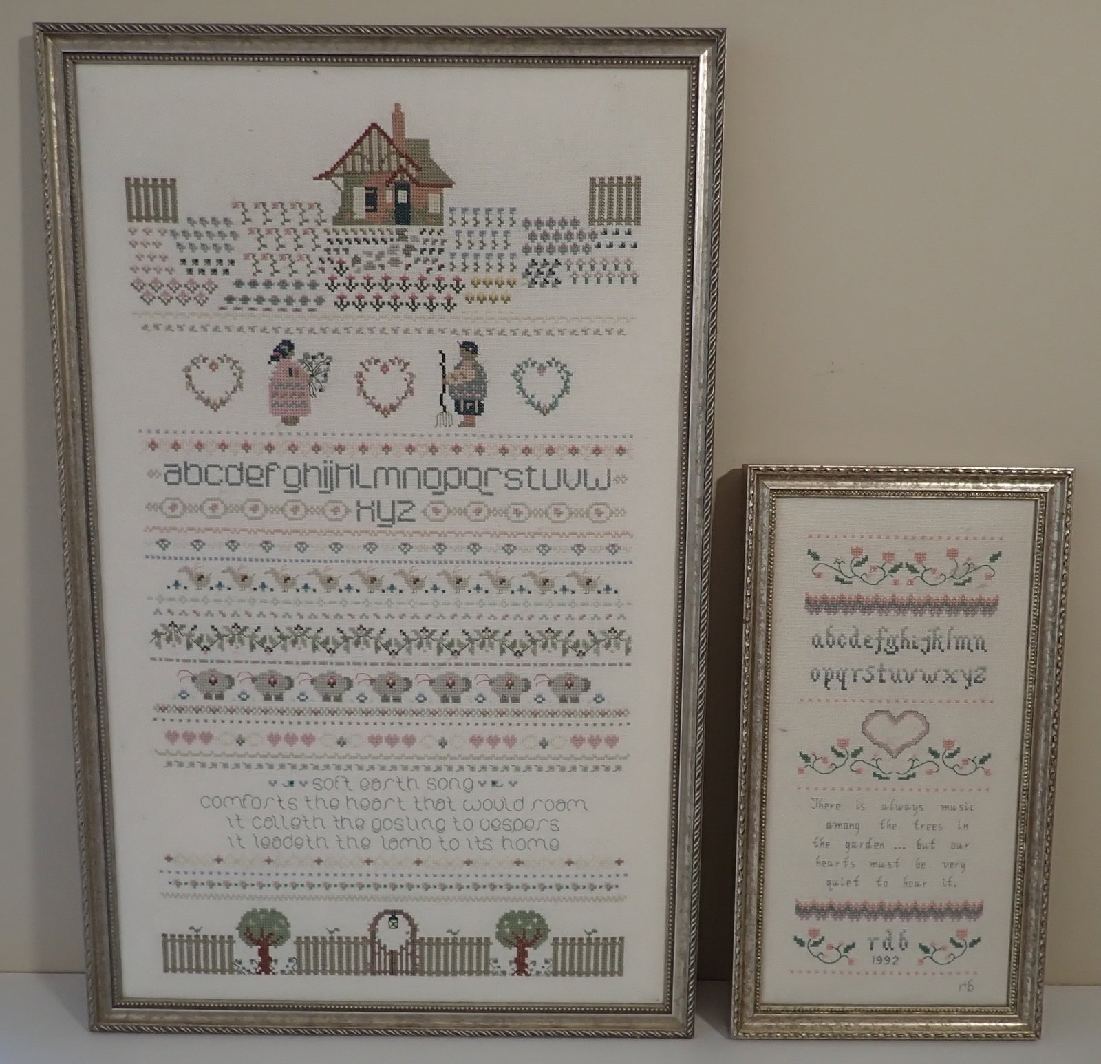 2 Roberta Bell Needlepoints / Samplers: Wife of Artist Bill Bell. Smaller one is initialed. Largest is approx 15 1/8" x 23 5/8". Shipping available ($25 handling charge, plus postage)