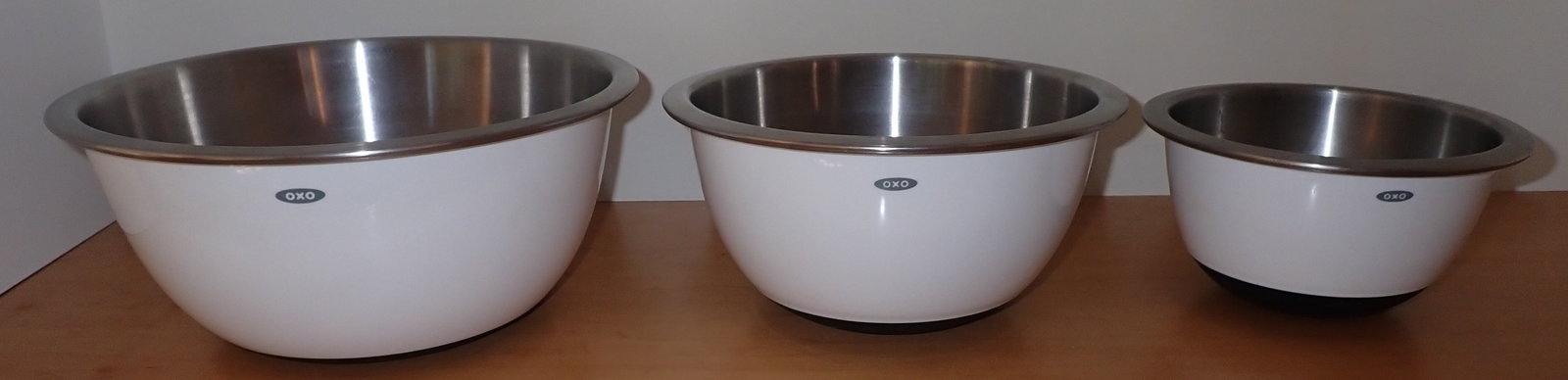 Oxo Stainless Steel Mixing Bowls: Largest is apprx 11 1/8" in diameter and 5" tall. Shipping available
