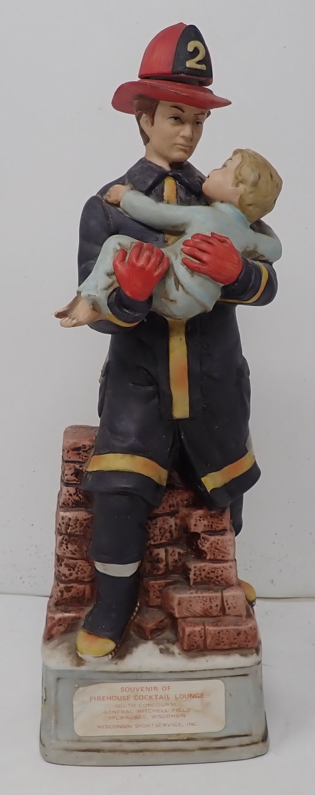 1974 Lionstone Fireman Whisky Decanter: Approx 13 1/4" tall. If there is anything in it, it must be dumped out before removing from house. No in house shipping !
