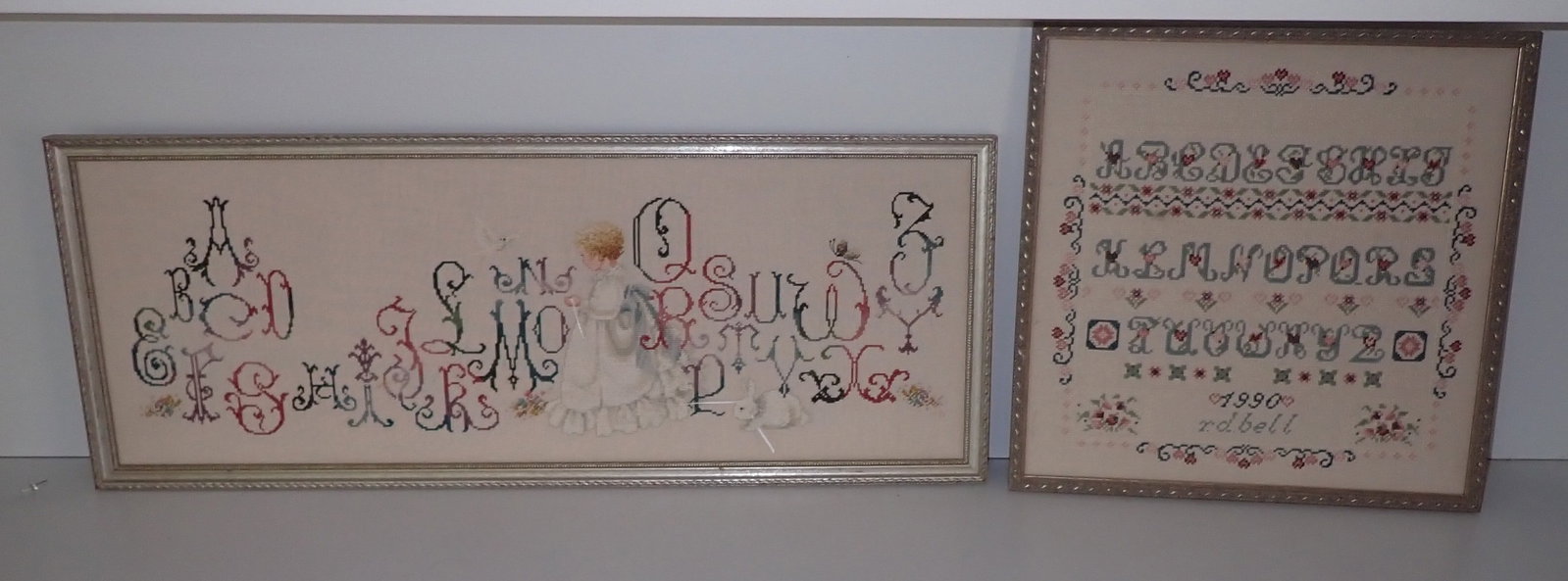 2 Roberta Bell Samplers: Wife of Artist Bill Bell. Largest is approx 11 5/8" x 29 1/2" and is initialed in lower right corner. No in house shipping !