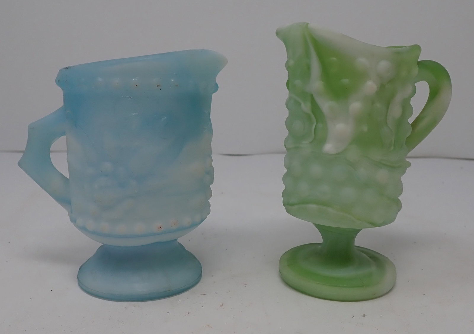 2 Kanawha Slag Glass Creamers: Tallest is apprx 4". Both have paper labels. Shipping available