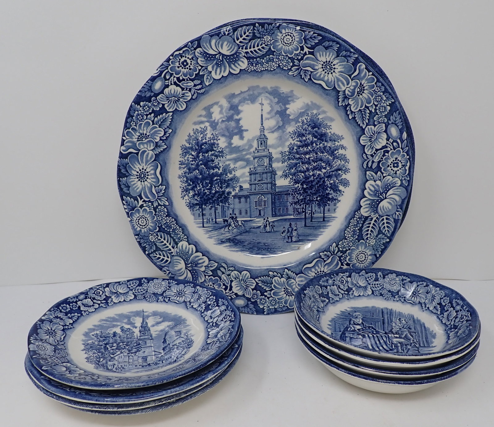 Liberty Blue Historic Colonial Dinnerware: There are (3) 9 3/4" Dinner Plates, (4) 5 1/8" Saucers, & (4) 5" Bowls . Shipping available