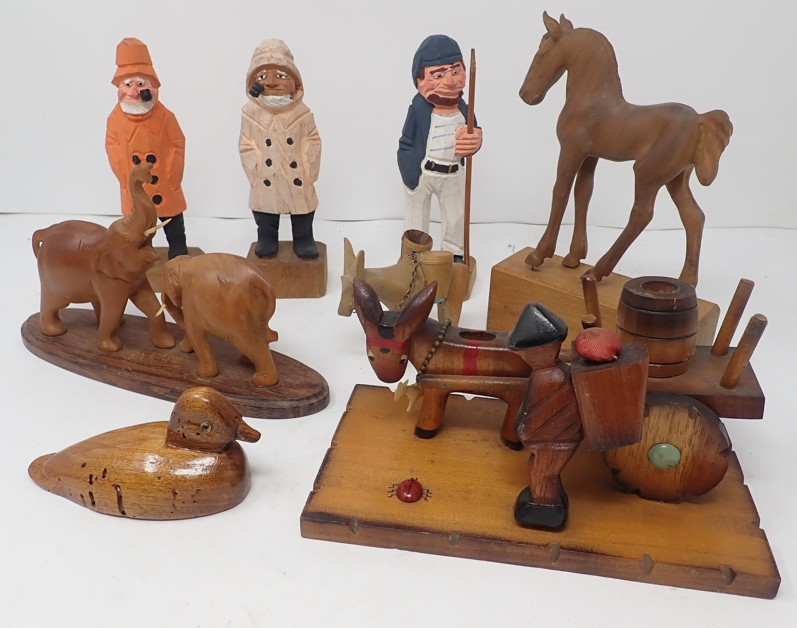 Wood Carved Figures: Tallest is approx 7" tall. Shipping available