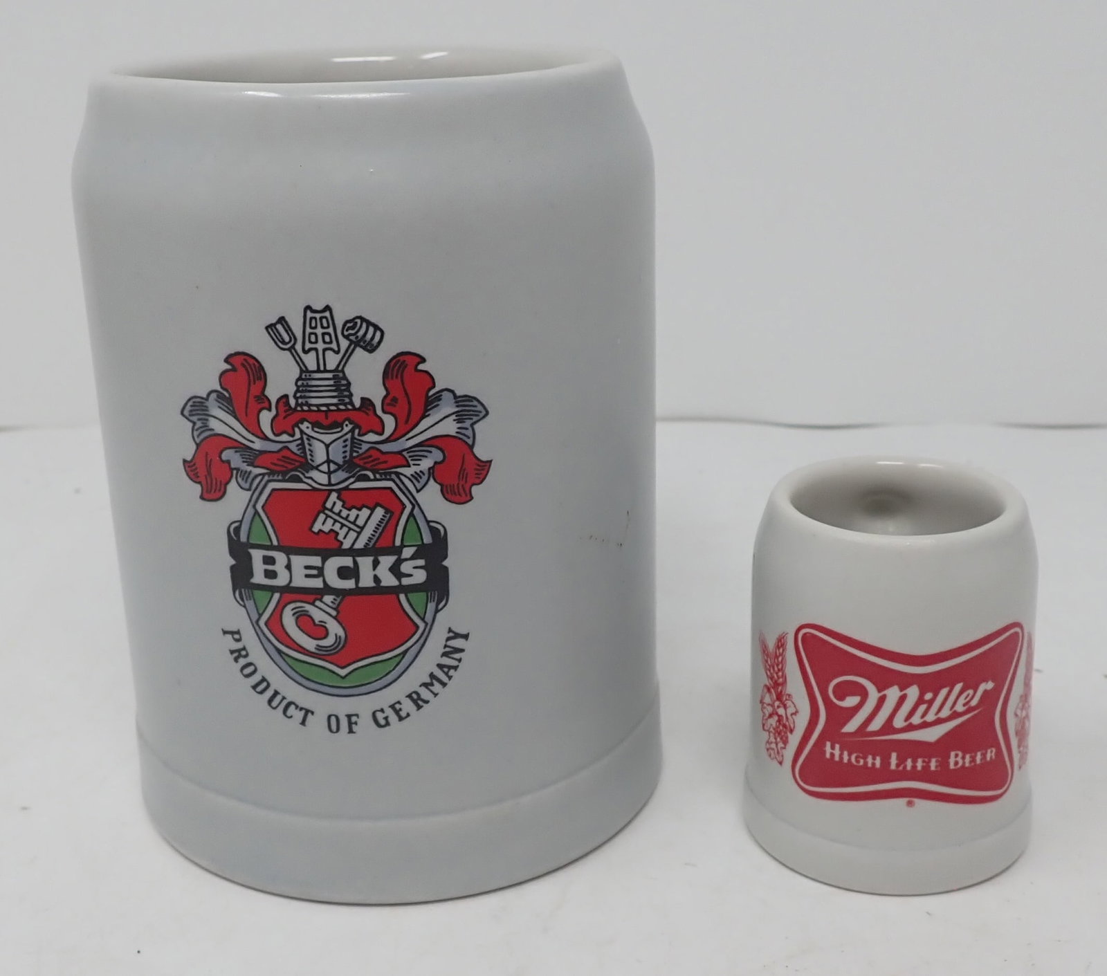 Ceramarte Beck's & Miller Beer Steins: Tallest is approx 5" tall. Shipping available.