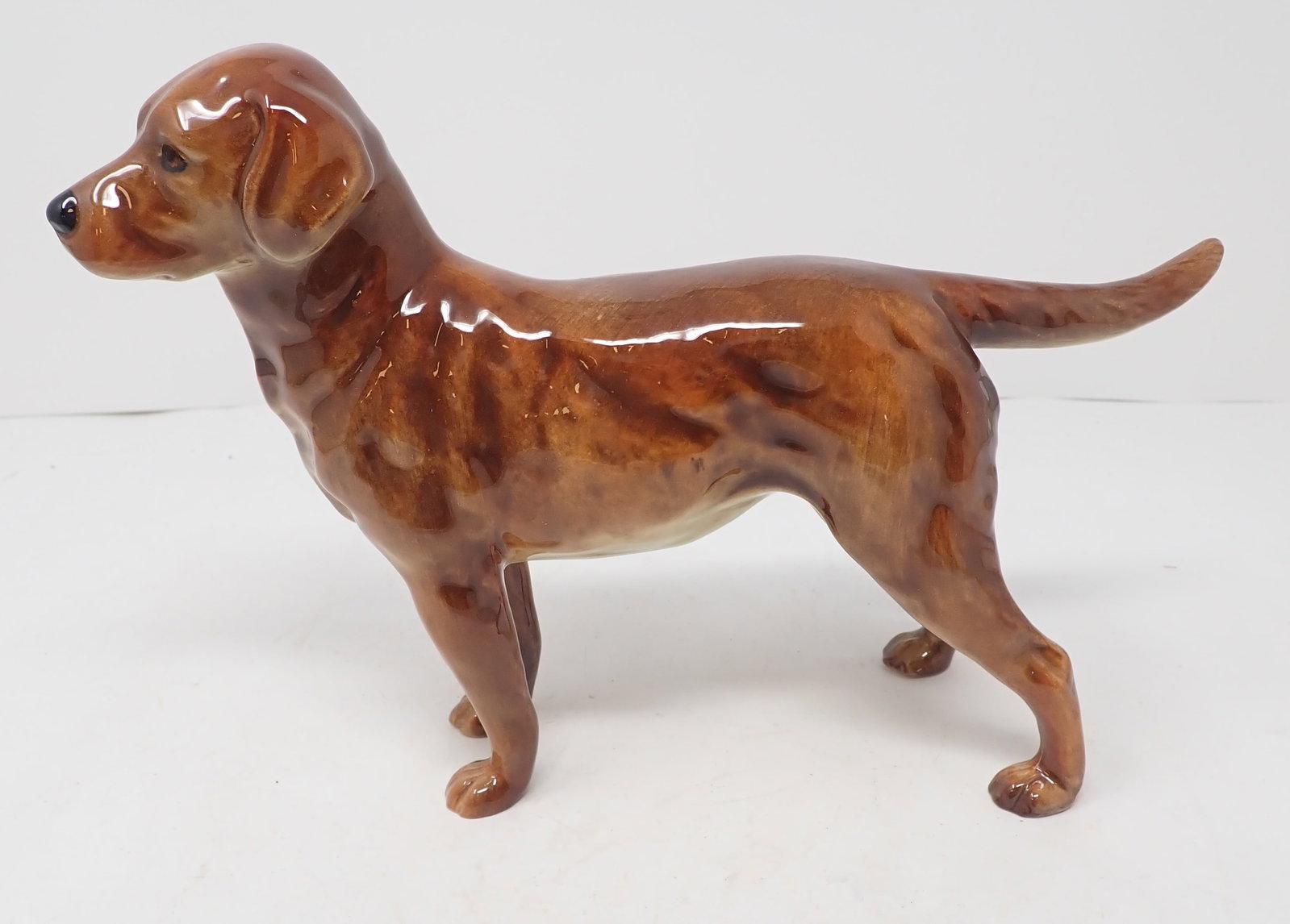 Dog Statue: Apprx 9 1/4" long and 6 1/2" tall. Shipping available