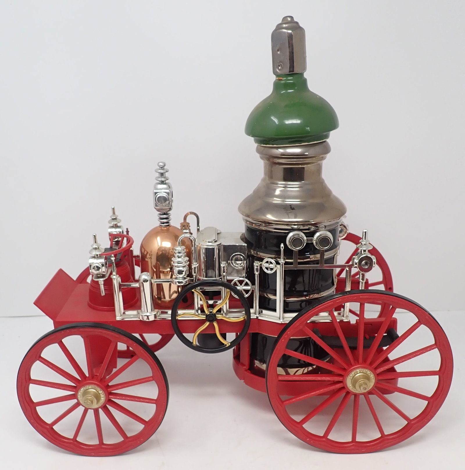 Beam 100 Fire Engine Whiskey Decanter: Approx 14 1/4" long and 14" tall. No in house shipping. If there is liquor in it, it must be dumped out before being removed.