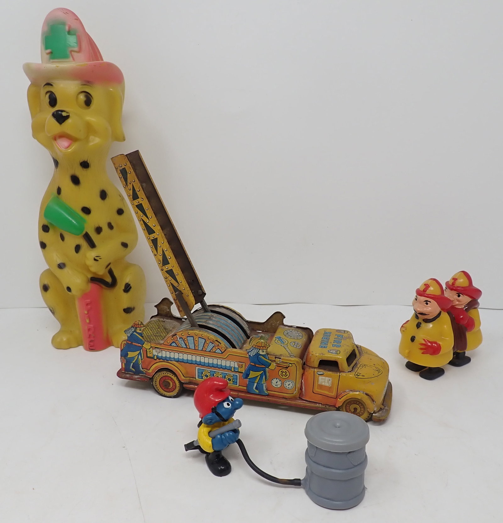 Tin Litho Fire Truck , Firefighter Walkers , Squeeze Toy , & Smurf (1 of 5)