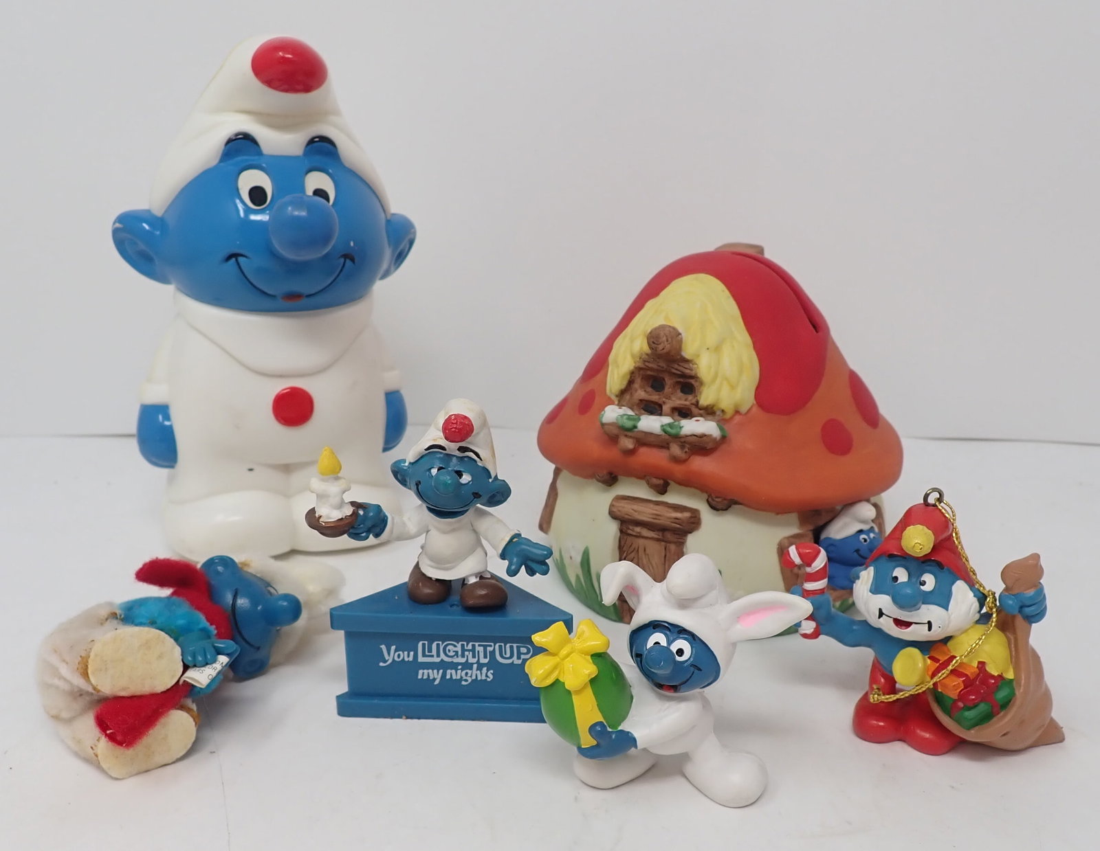 Wallace Berrie Smurf Bank, Peyo Walker Toy , & Misc: Tallest is apprx 6 1/2" tall. Shipping available