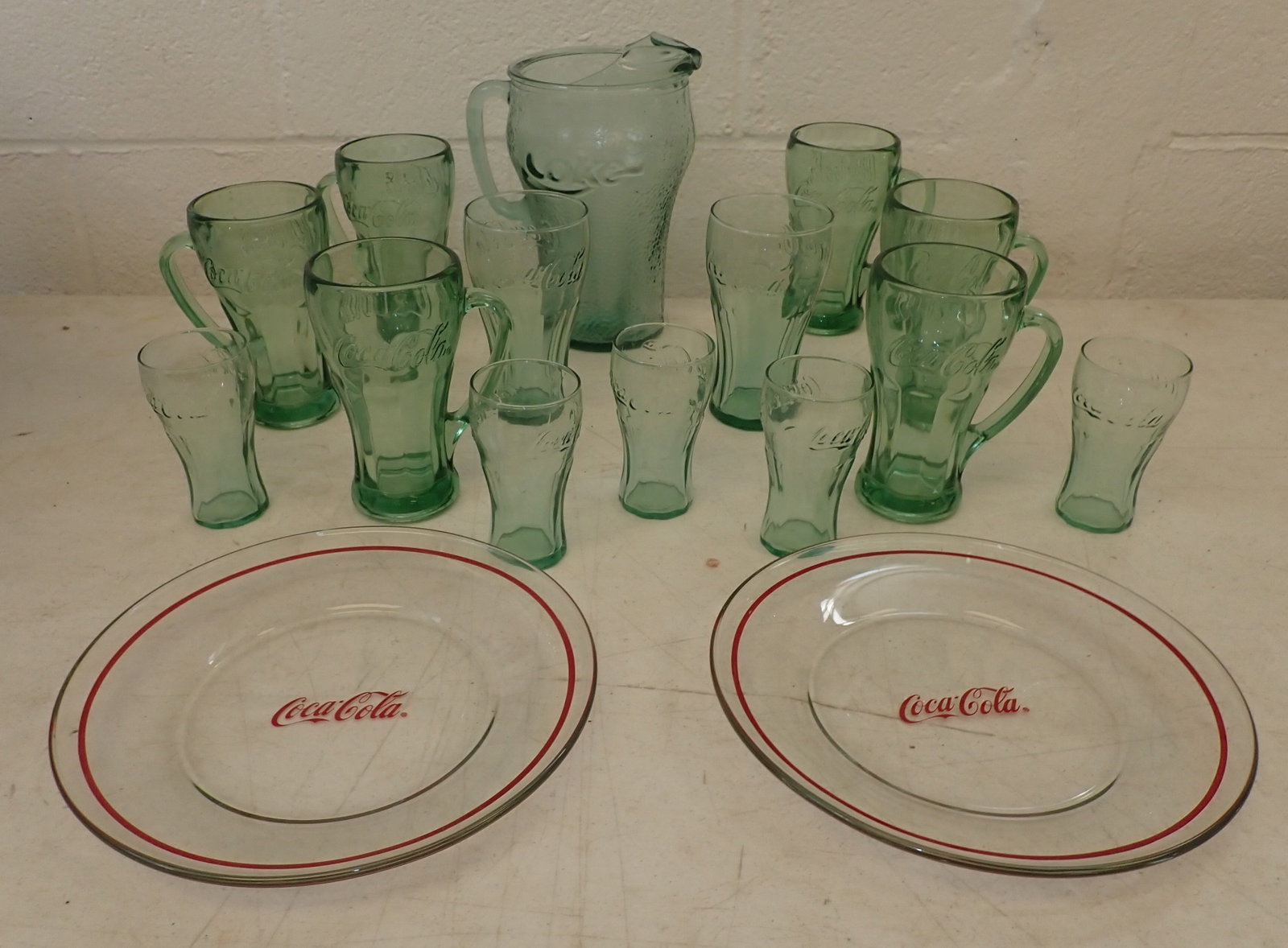 Coca Cola Pitcher, Drinking Glasses, Mugs ,& Plates: Coke pitcher is approx 9 1/2" tall. There are 4 plates ( look at last photo )NO in house shipping !