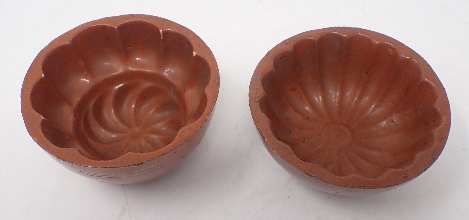 2 Redware Molds: Left one is approx 4" in diameter and 2 1/4" tall. Shipping available