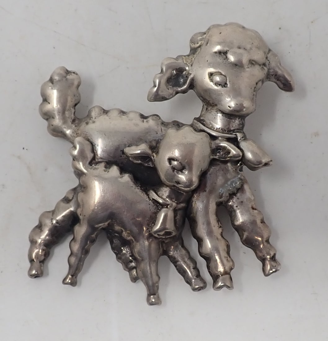 Sterling Silver Sheep / Lamb Brooch: Approx 2 1/4" x 2 1/2". Weighs approx 22.05 dwt . Shipping available