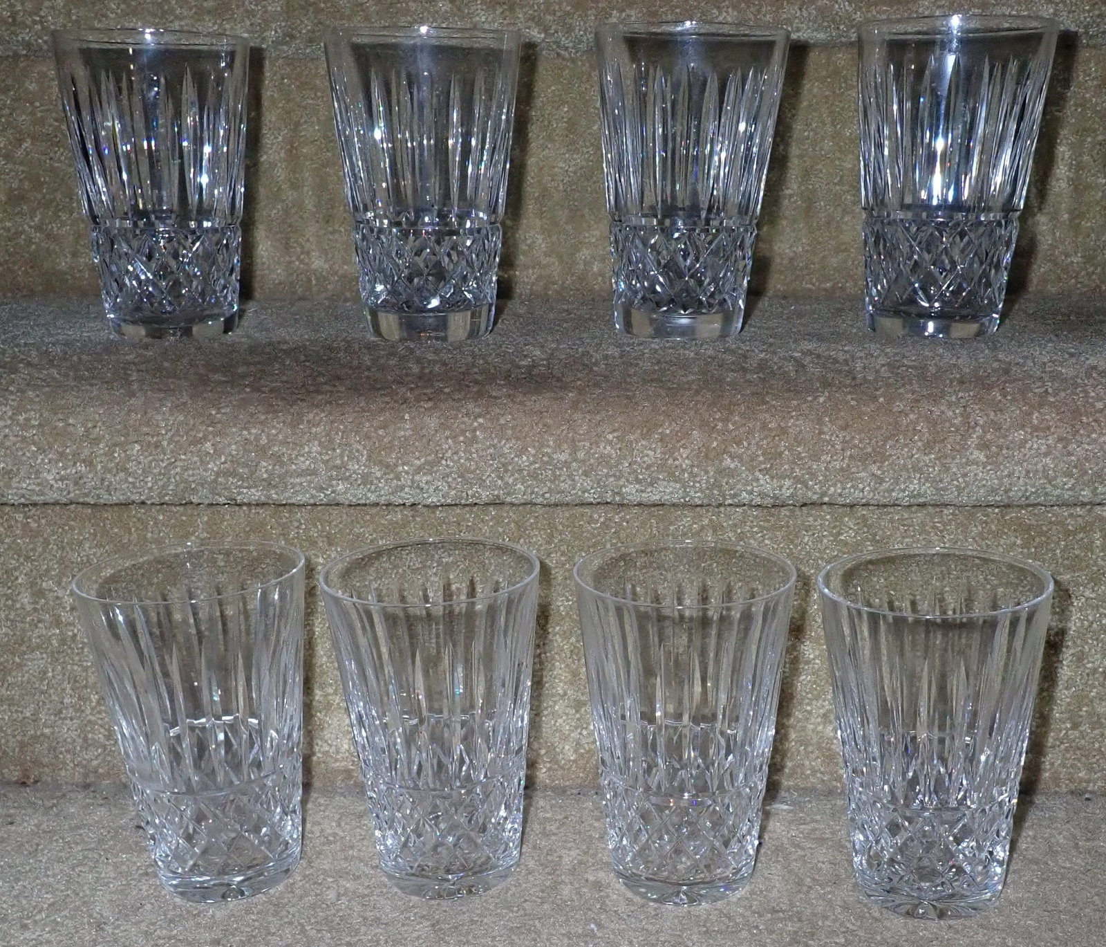 8 Waterford Highball Drinking Glasses: Apprx 3 1/4" in diameter and 5 1/8" tall. Shipping available ($20 handling charge, plus postage)