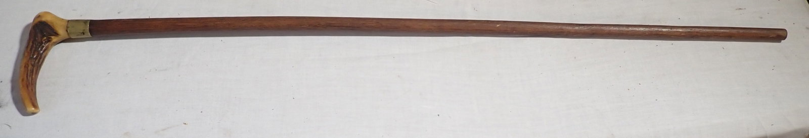 Walking Stick w/ Bone Handle: Approx 31 7/8" long. Shipping available