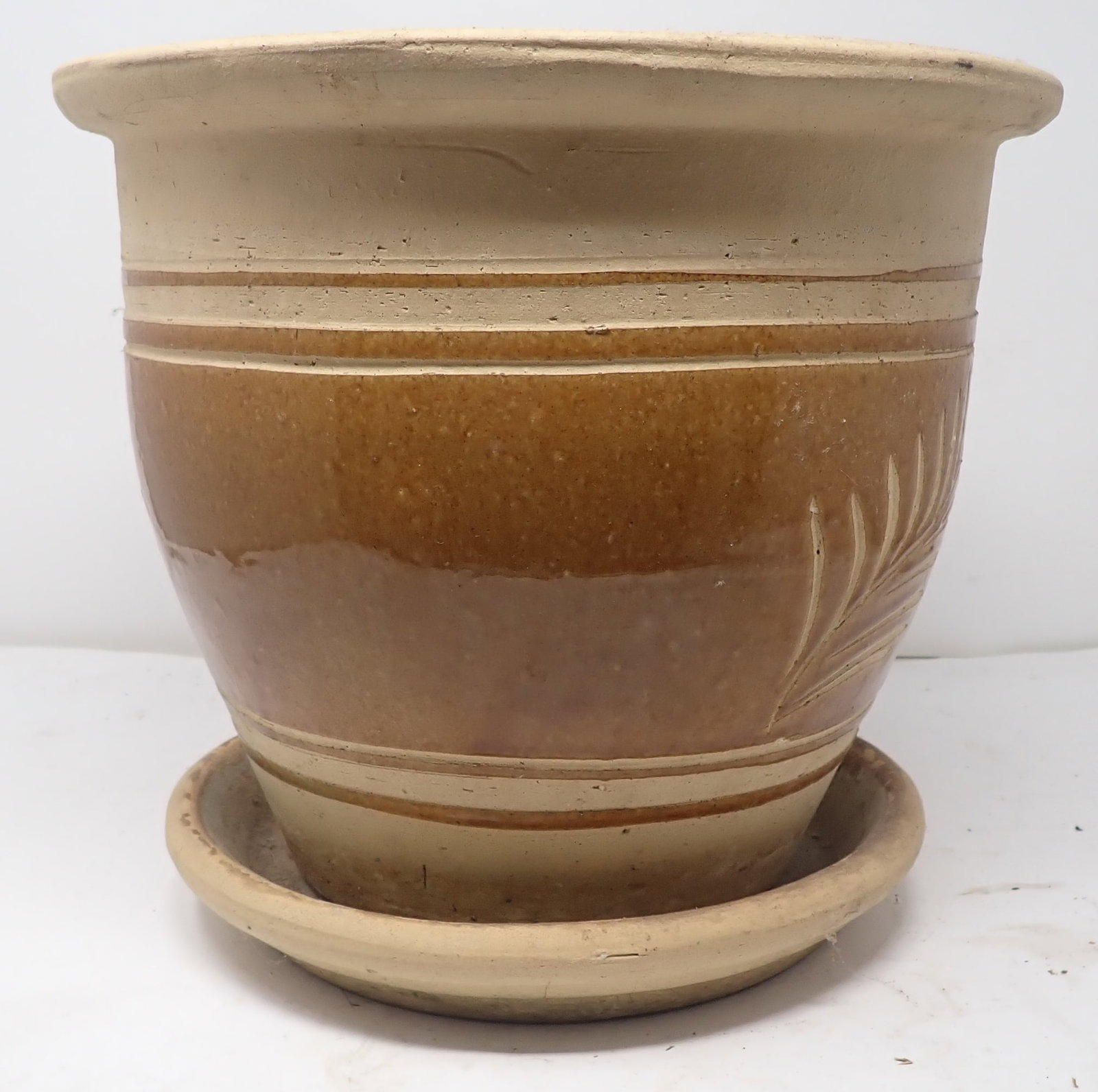 Pottery Planter: Approx 12" in diameter and 10 1/2" tall. Shipping available
