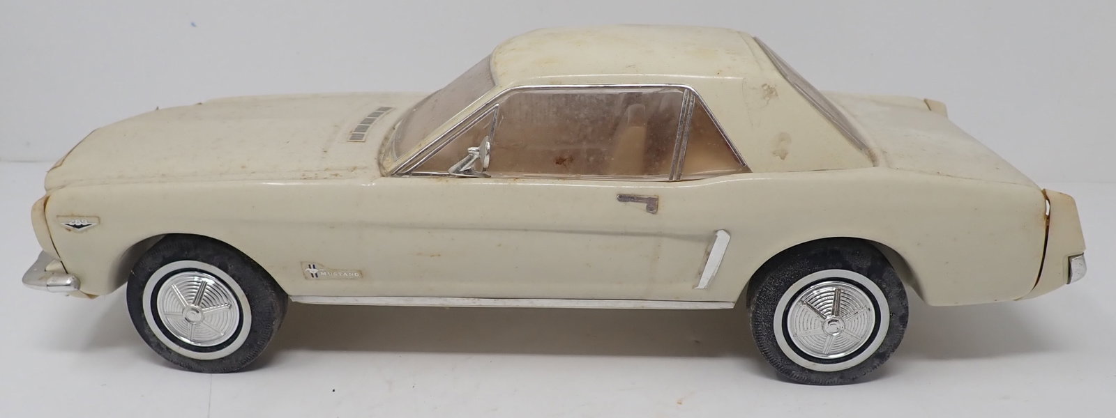 Beam 1964 Ford Mustang Decanter: Approx 13 1/4" long. If there is liquor in it, it must be dumped before removing from house. No in house shipping !