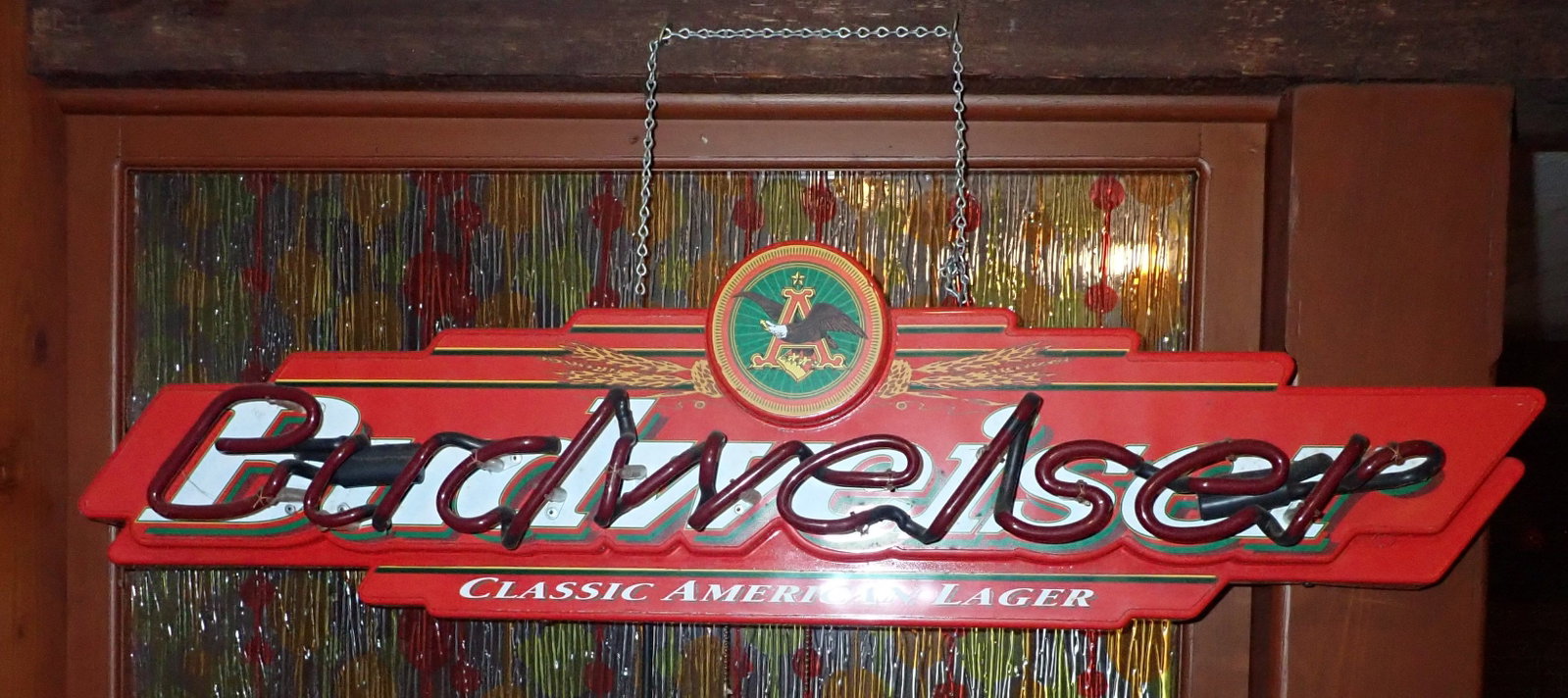 Budweiser Neon Lighted Bar Sign: Apprx 36" long. No in house shipping ! Buyer to remove from basement