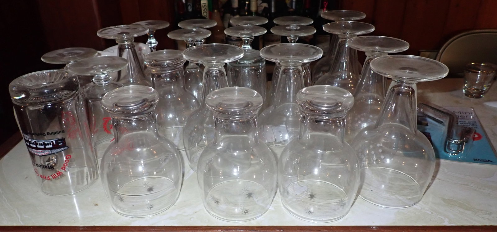 Misc Bar Contents: Lot includes everything on, under, and behind bar EXCEPT any Liquor ! Do not remove the liquor ! Take what you want and leave the rest. No in house shipping ! Buyer to remove from the basement.