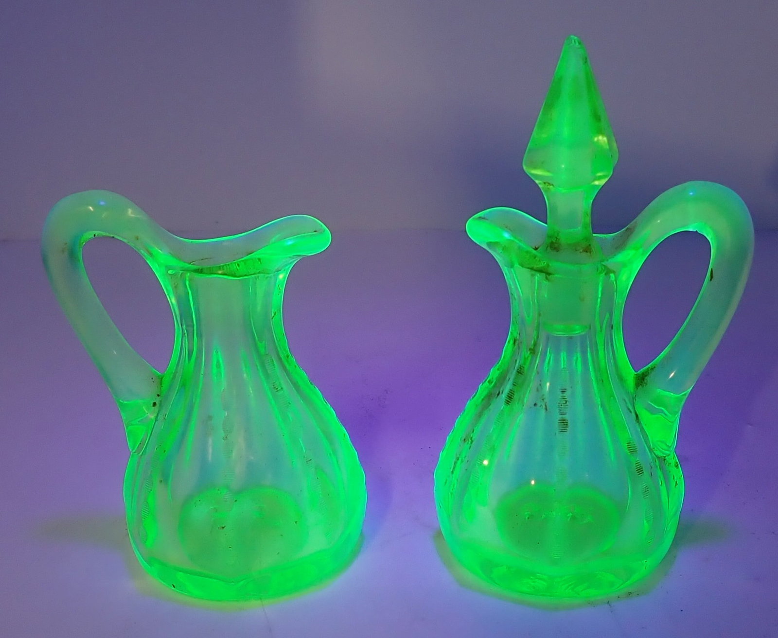 Blown Uranium Glass Cruets: Approx 5 1/2" tall to top of stopper. Shipping available