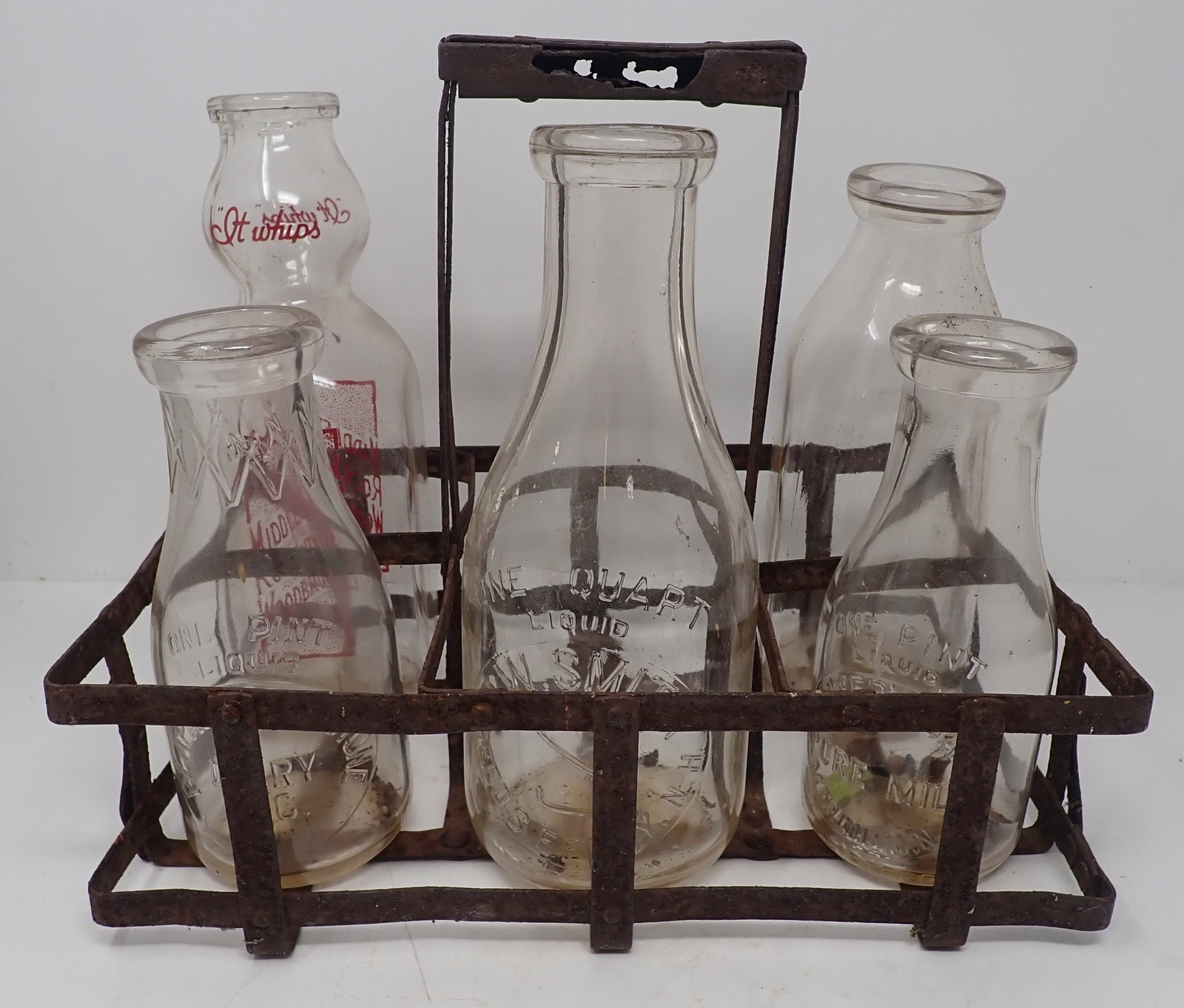 NJ , PA , NH , Milk Bottles w/ Carrier: Carrier is approx 8 1/4" x 12 1/2" x 11 1/2" tall. Shipping available ($20 handling charge, plus postage)