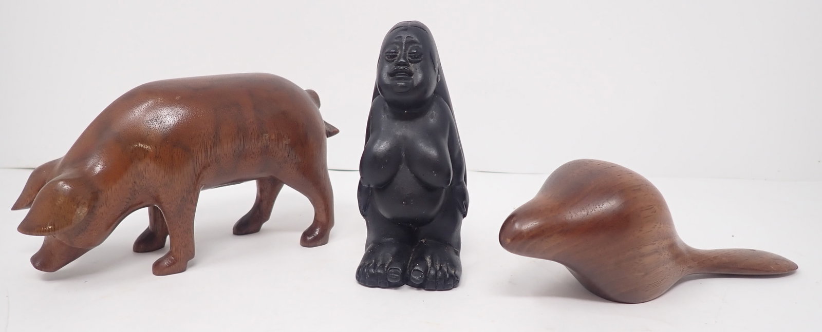 JA Bradley Wooden Pig & Lava Nude Woman Figure: Pig is approx 5" long and 3" tall. Shipping available