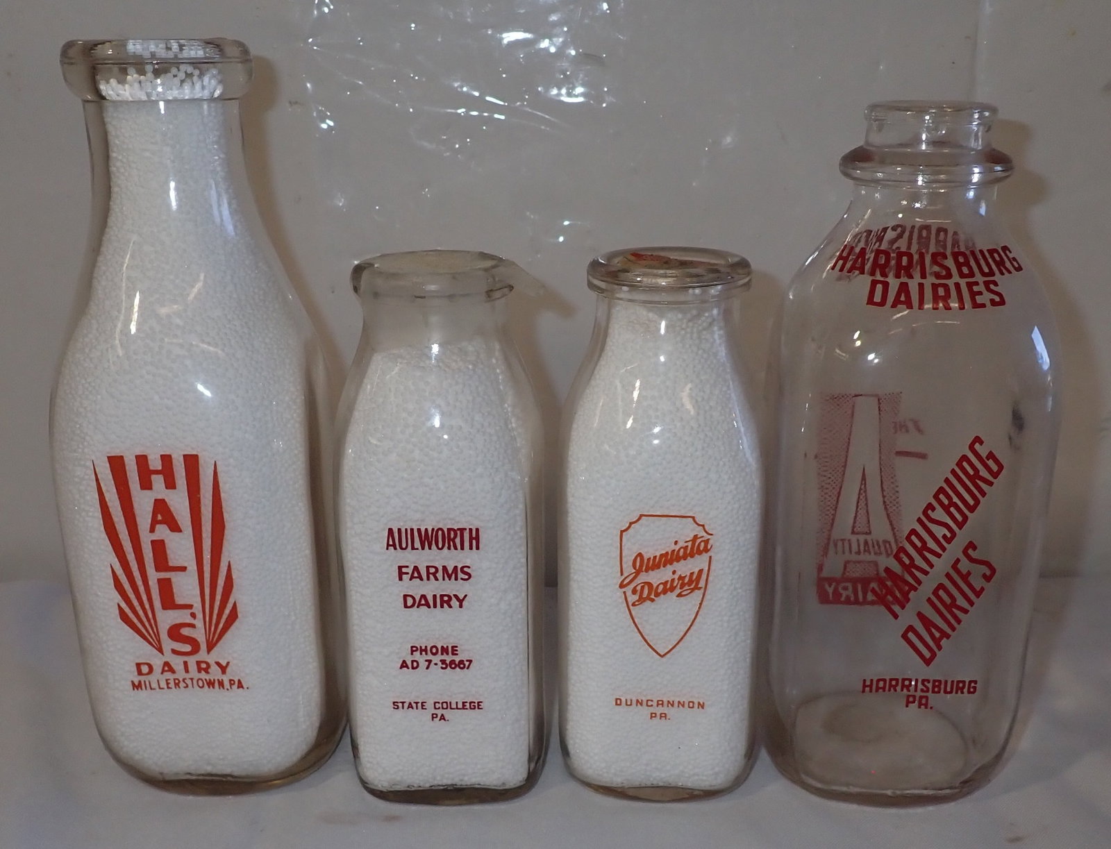 Pennsylvania Milk Bottles: Tallest is approx 9 3/4" tall. Shipping available